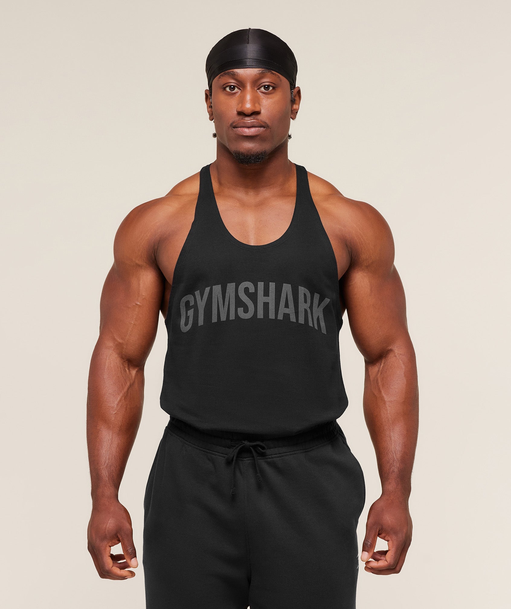 gymshark-power-stringer-sleeveless-tops-black-aw25