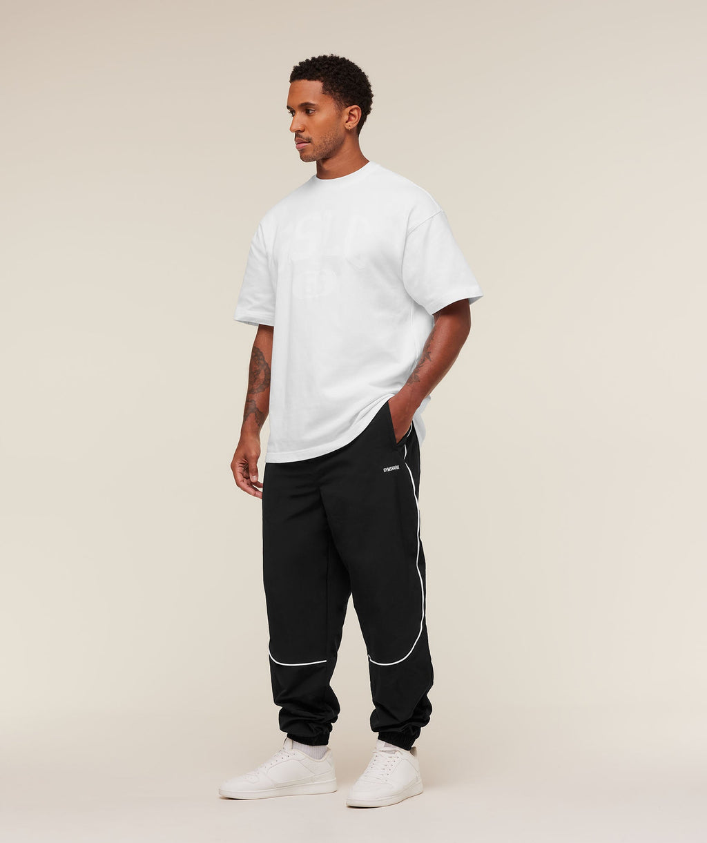 gymshark-retro-shell-track-pants-pants-black-aw25