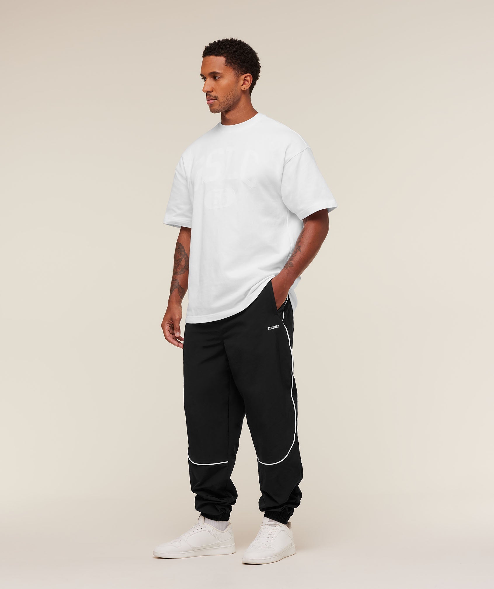 gymshark-retro-shell-track-pants-pants-black-aw25
