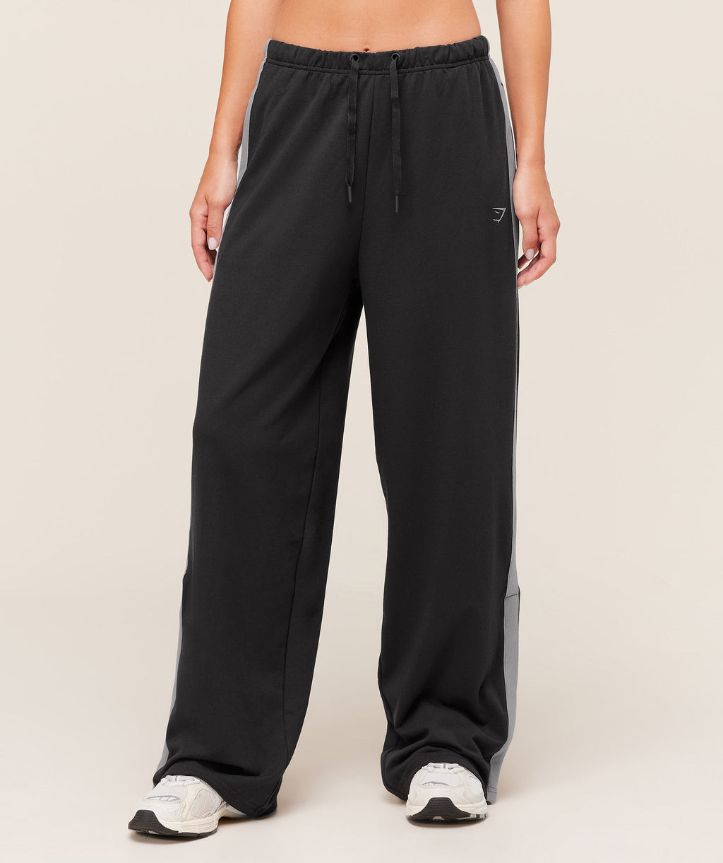 gymshark-retro-stripe-snap-pant-pants-black-aw25