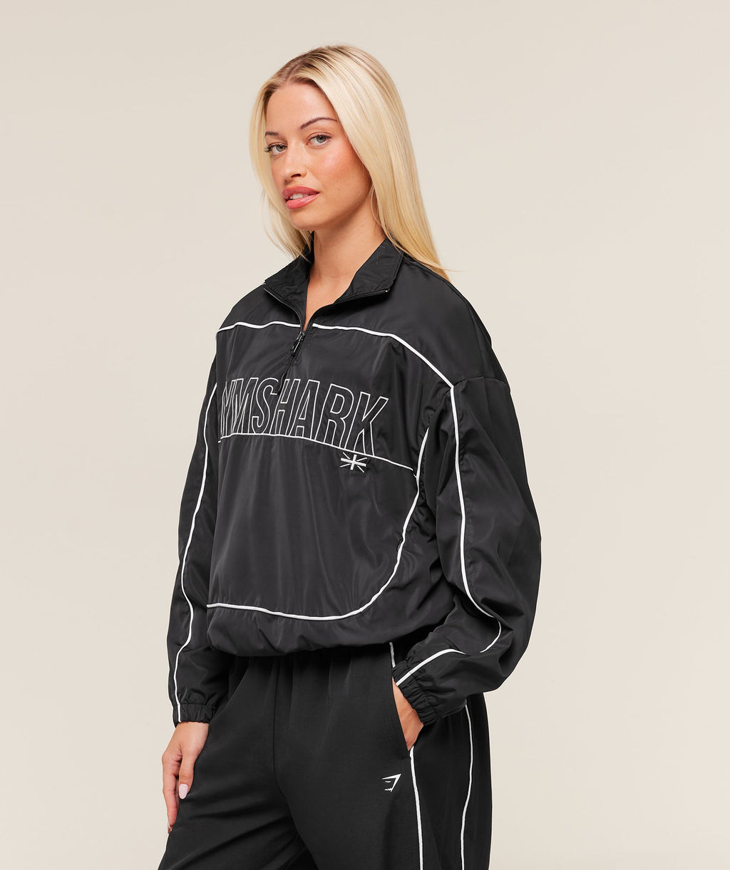 gymshark-wordmark-1-4-zip-track-jacket-jackets-outerwear-black-aw25
