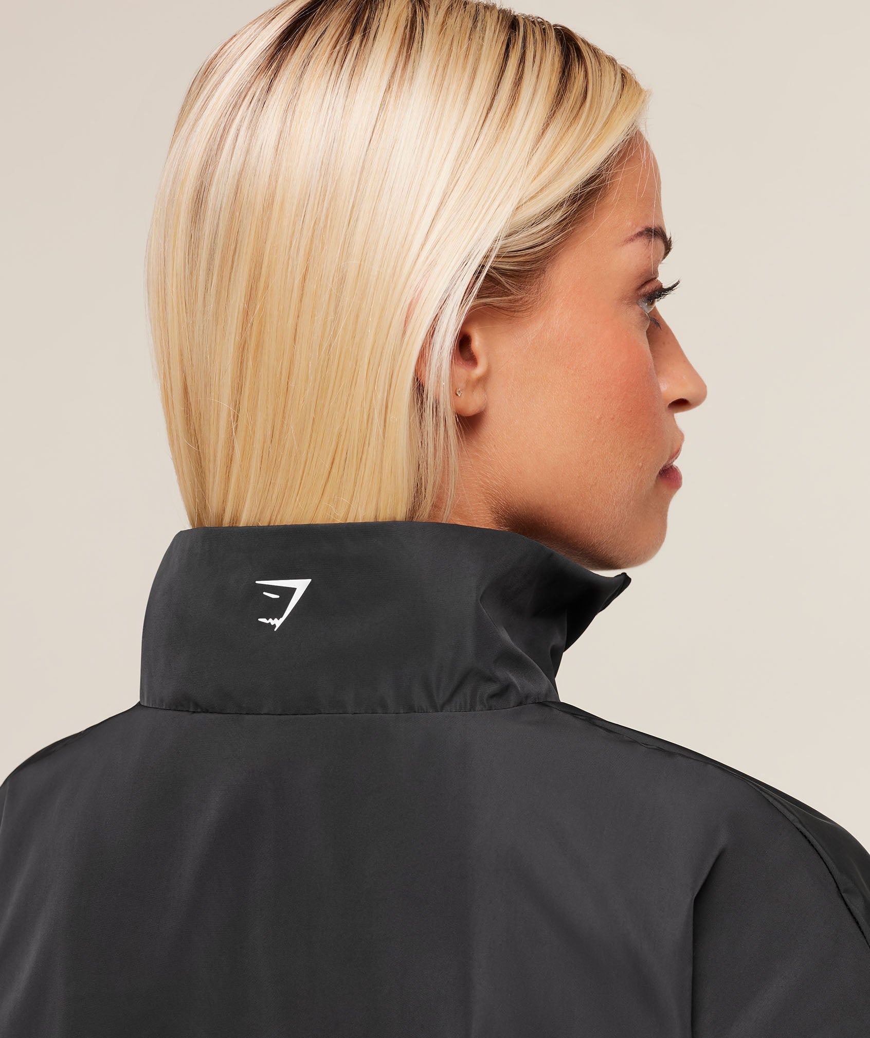 gymshark-wordmark-1-4-zip-track-jacket-jackets-outerwear-black-aw25