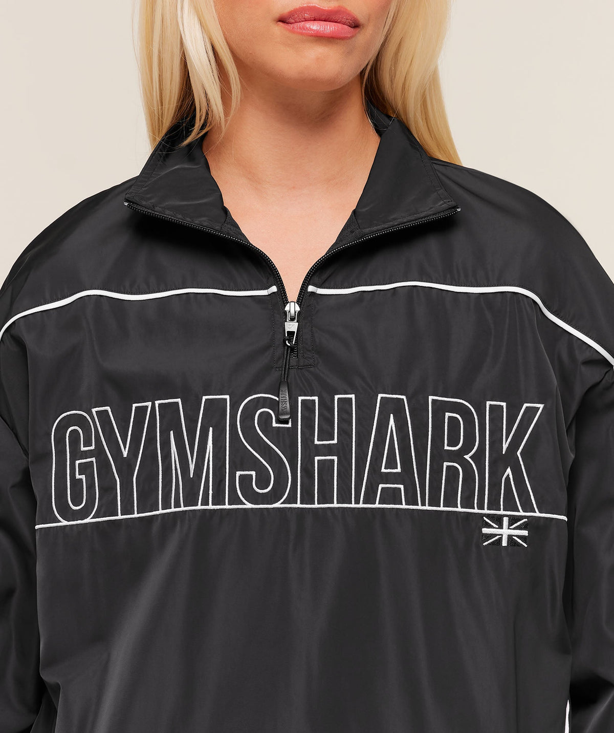 gymshark-wordmark-1-4-zip-track-jacket-jackets-outerwear-black-aw25