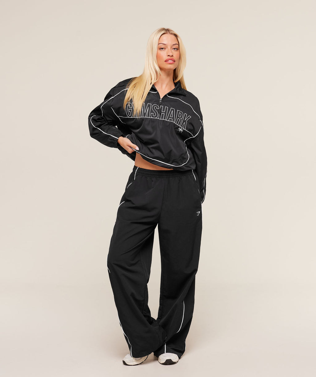 gymshark-wordmark-1-4-zip-track-jacket-jackets-outerwear-black-aw25