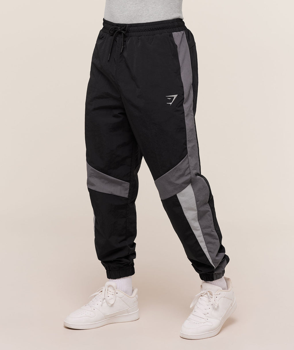 gymshark-retro-track-pants-black-dark-grey-smokey-grey-aw24