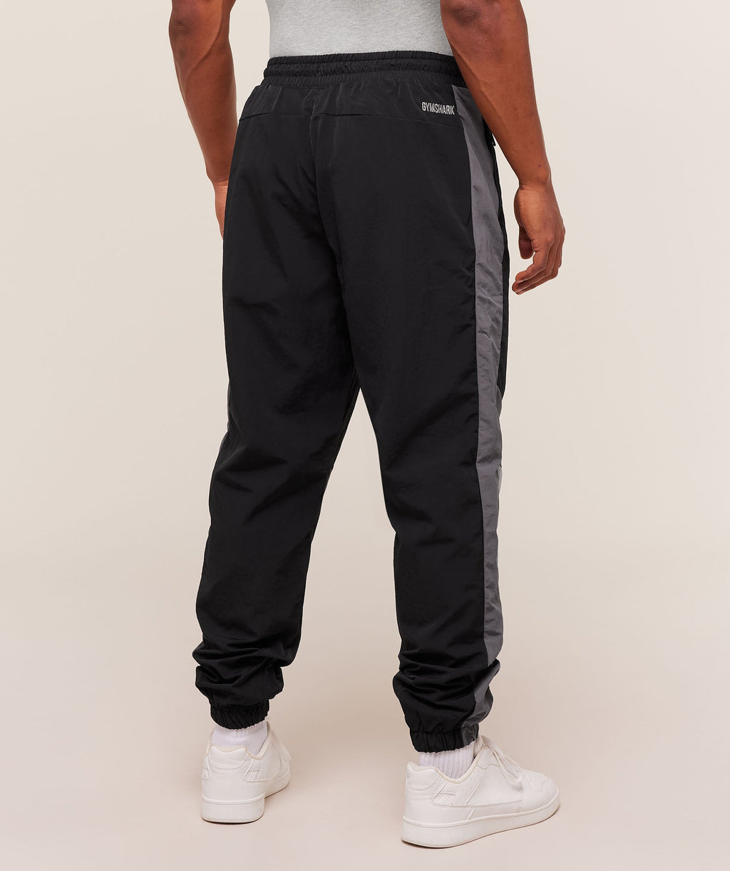 gymshark-retro-track-pants-black-dark-grey-smokey-grey-aw24