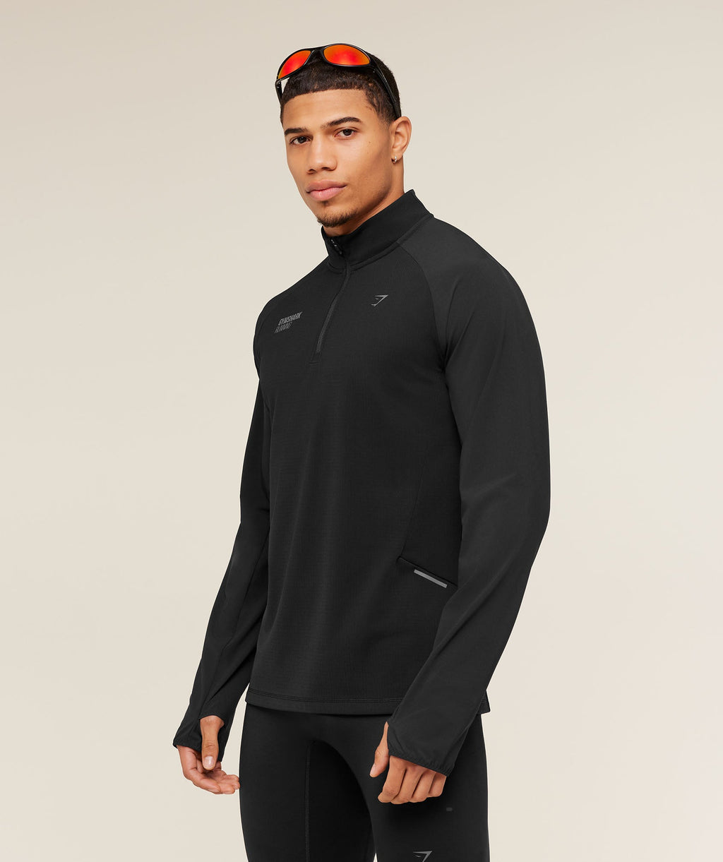 gymshark-running-elite-1-4-zip-pullovers-black-ss25-1