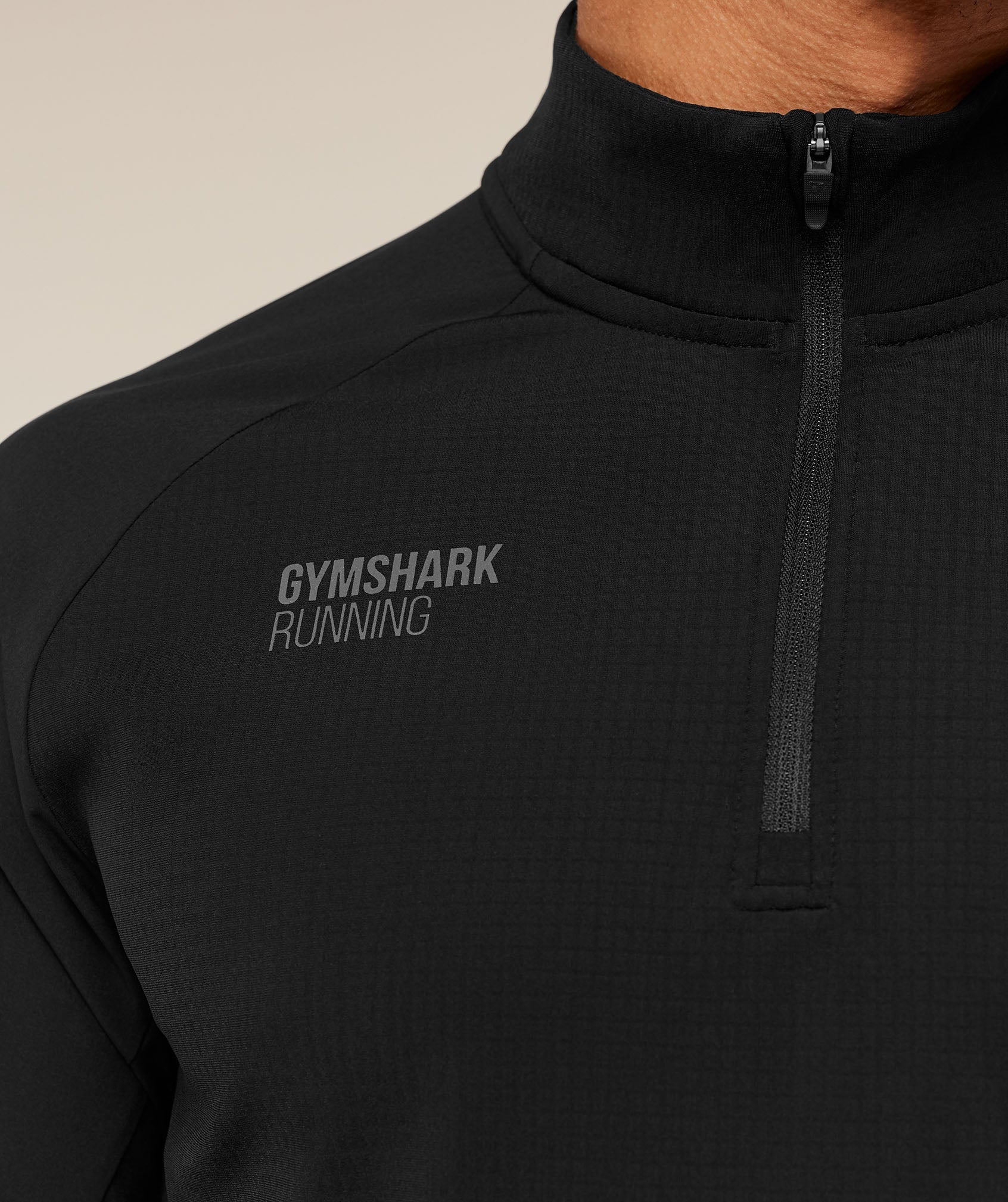 gymshark-running-elite-1-4-zip-pullovers-black-ss25-1