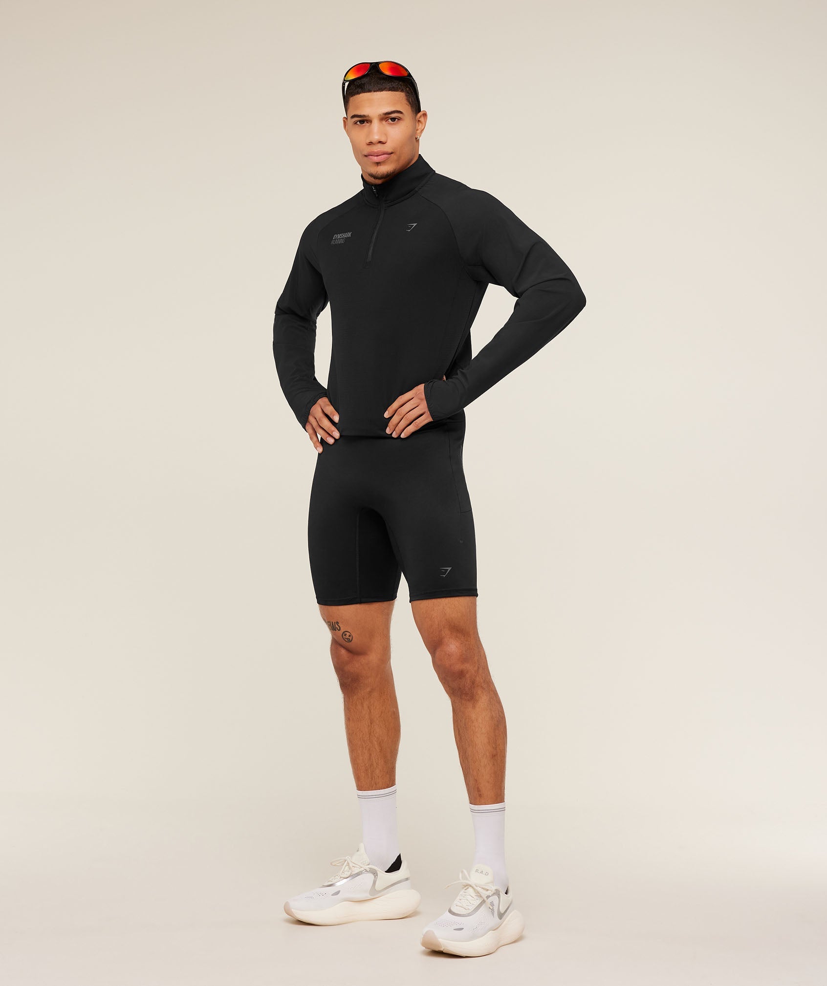 gymshark-running-elite-1-4-zip-pullovers-black-ss25-1