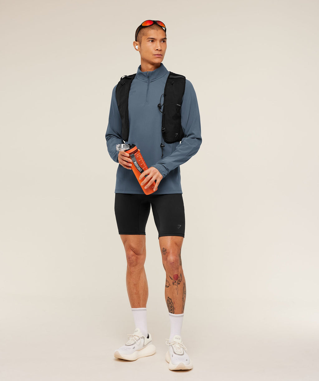 gymshark-running-elite-1-4-zip-pullovers-blue-ss25-1