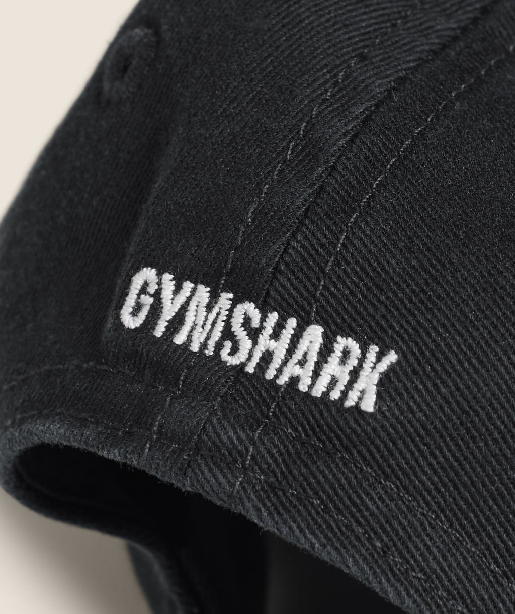 gymshark-relaxed-cap-black-ss25