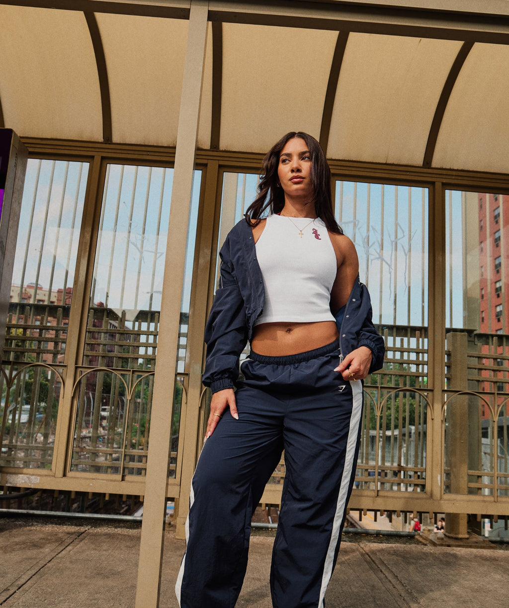gymshark-gymshark-x-analis-woven-track-jacket-jackets-outerwear-blue-aw25
