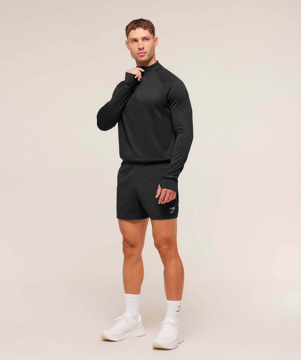 gymshark-running-1-4-zip-pullovers-black-aw25