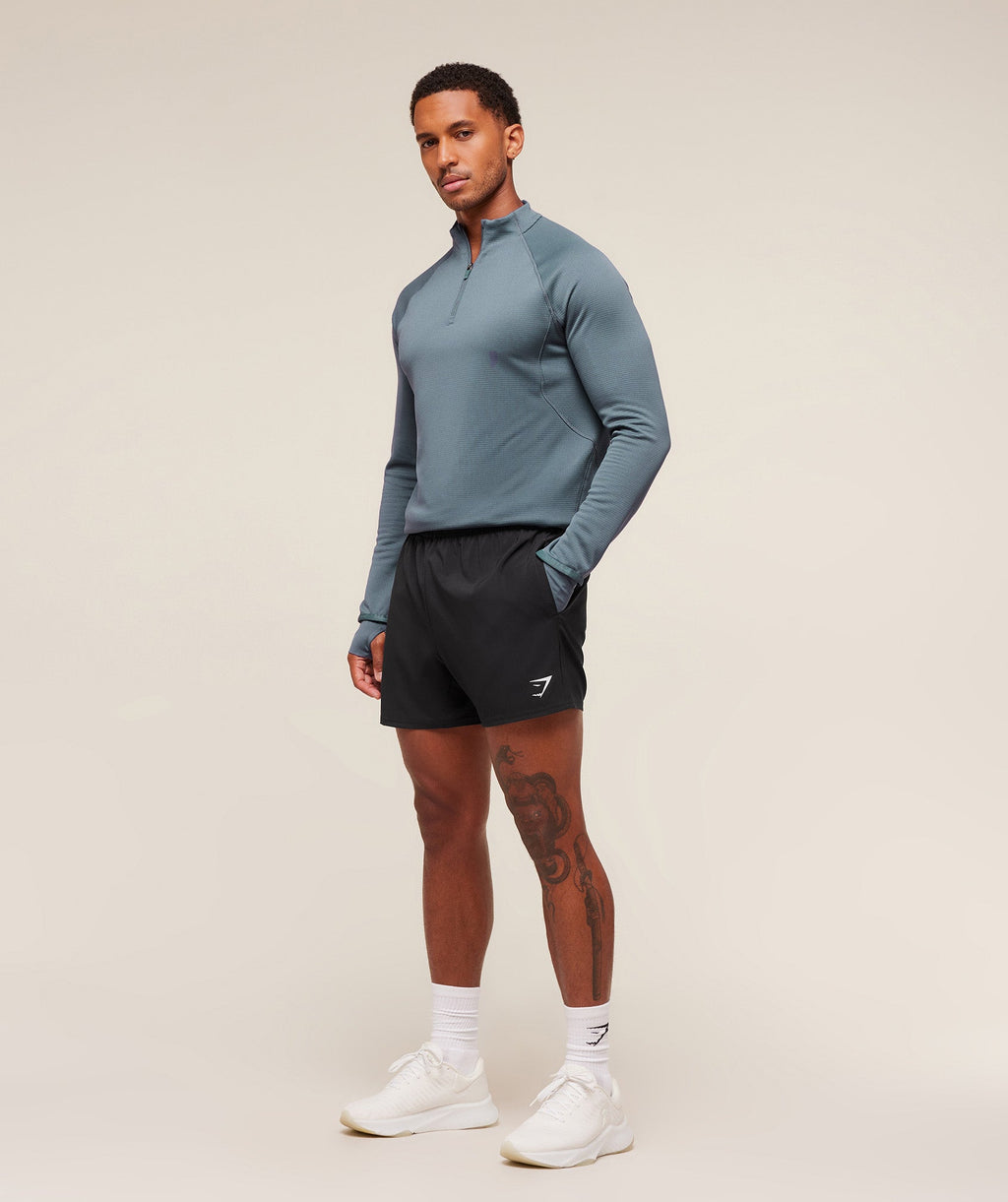 gymshark-running-1-4-zip-pullovers-blue-aw25