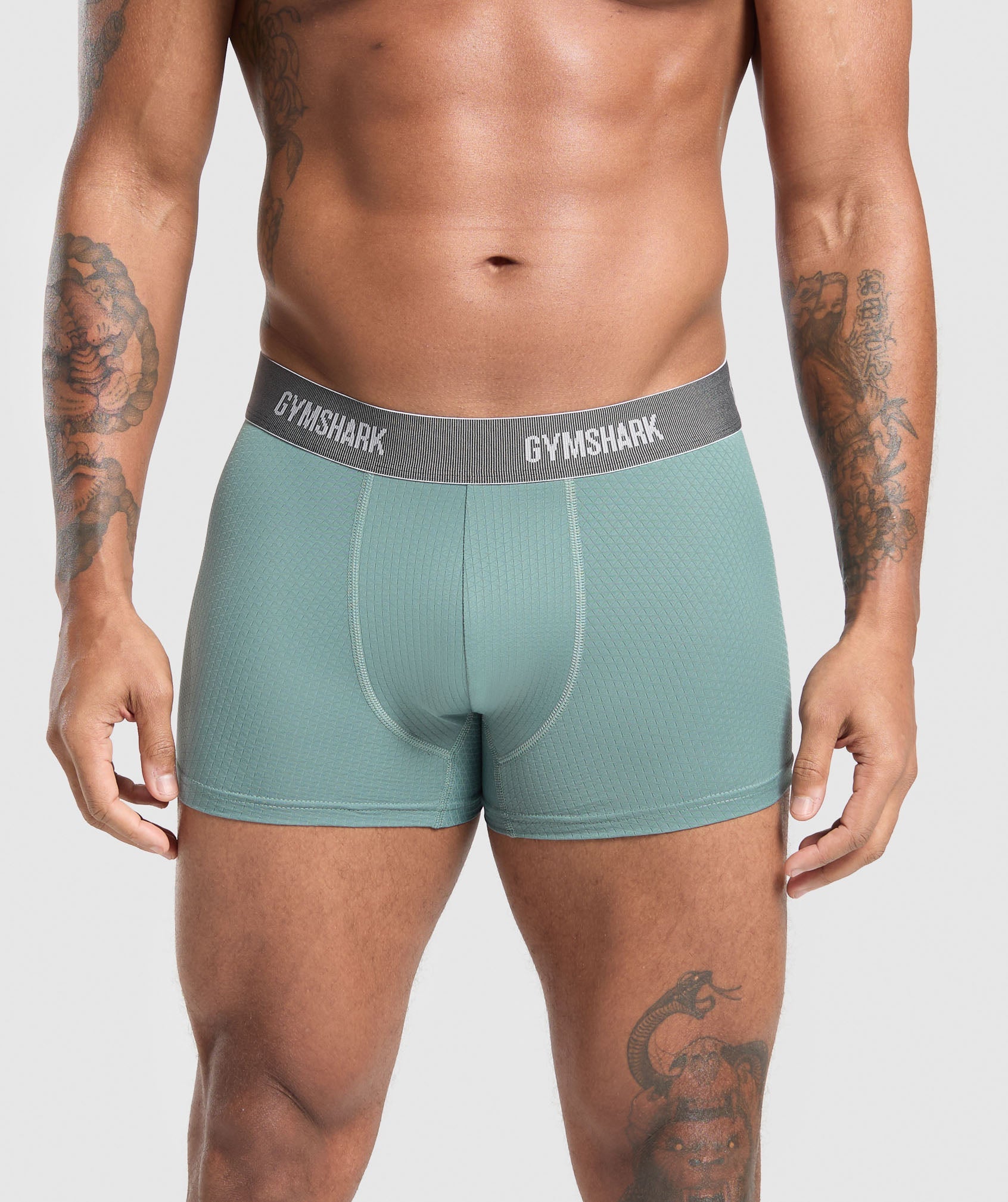 gymshark-sports-tech-boxer-3pk-black-deep-orange-celeste-blue-ss25