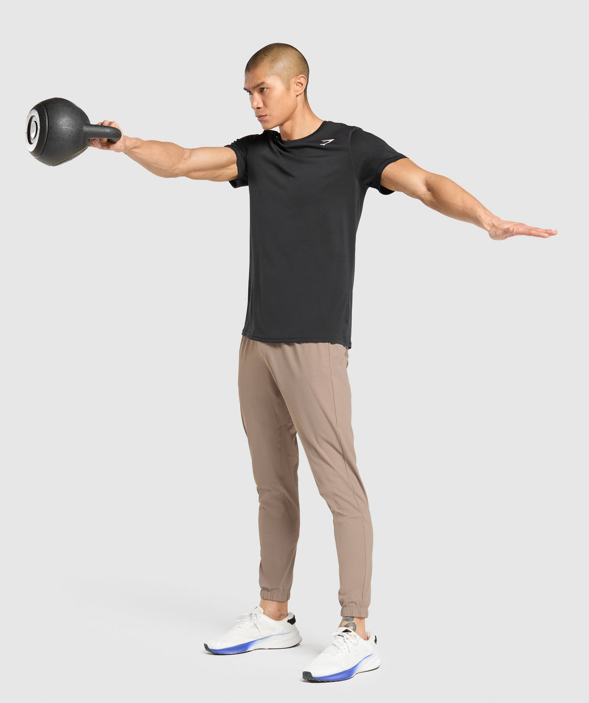 gymshark-studio-joggers-pants-brown-ss25