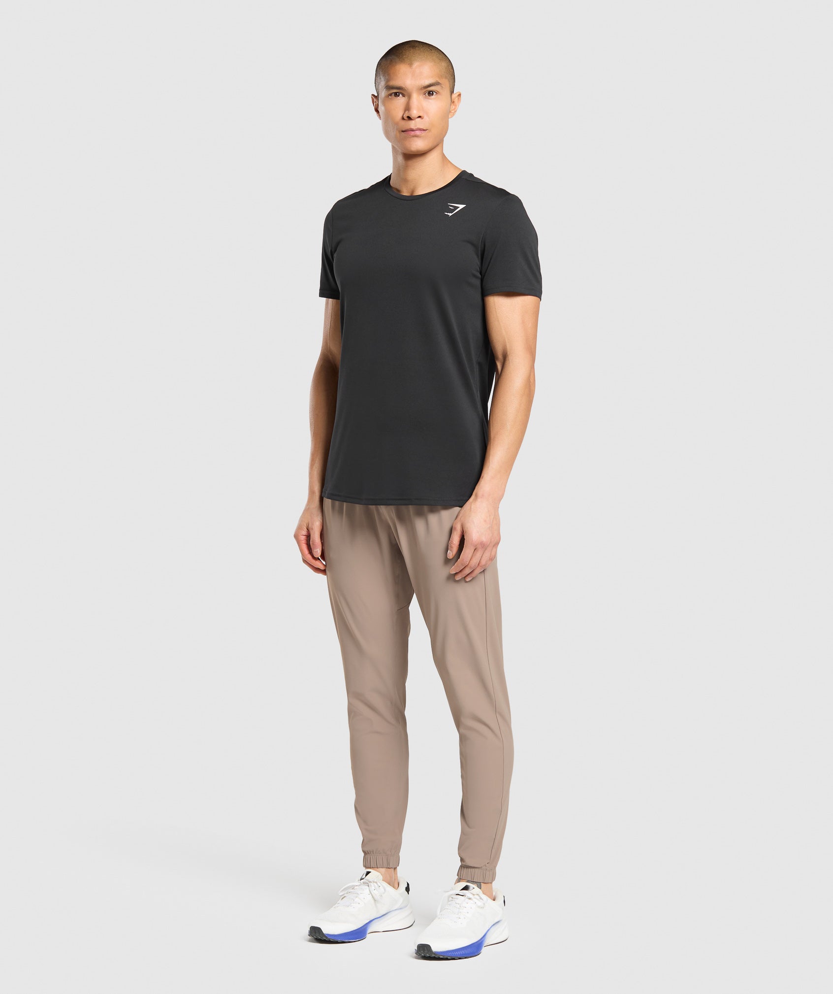 gymshark-studio-joggers-pants-brown-ss25