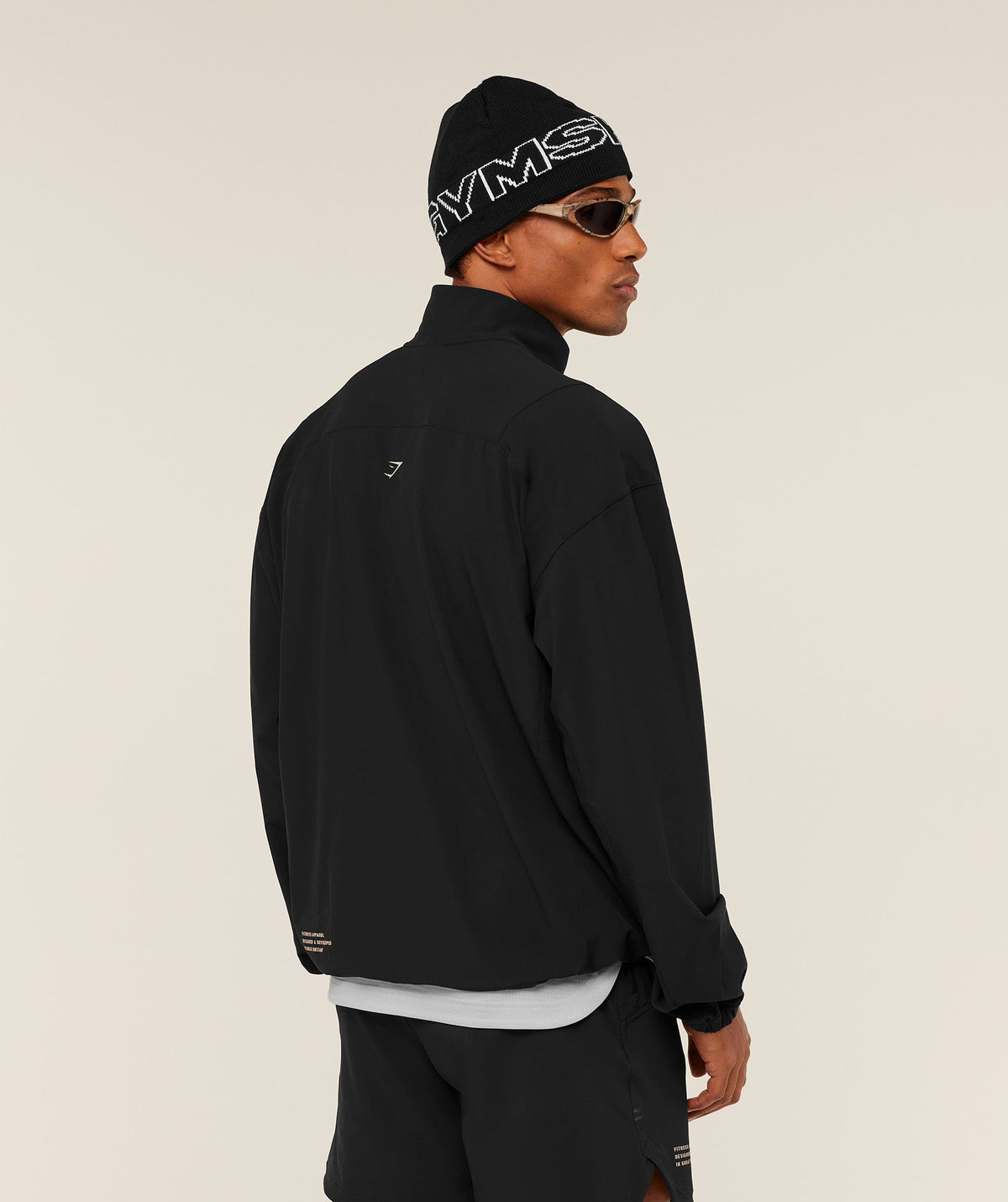 gymshark-tactical-shell-1-4-zip-pullovers-black-aw25