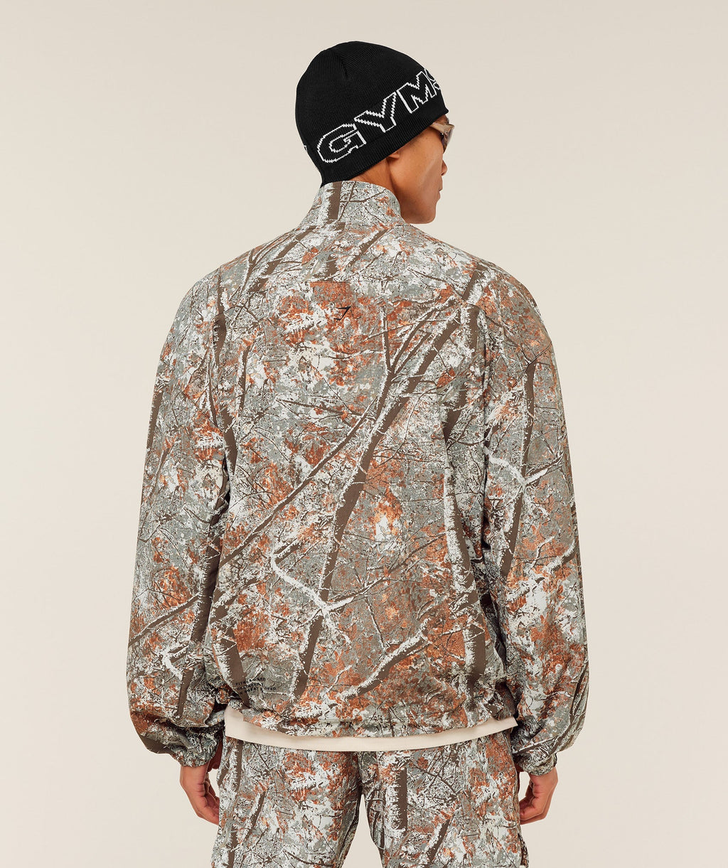 gymshark-tactical-shell-1-4-zip-pullovers-brown-aw25