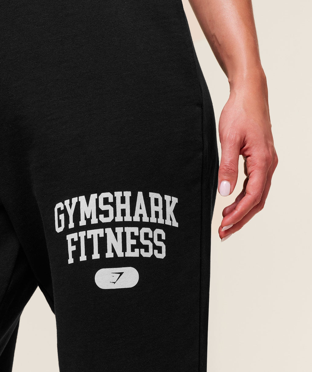 gymshark-varsity-graphic-oversized-jogger-pants-black-ss25