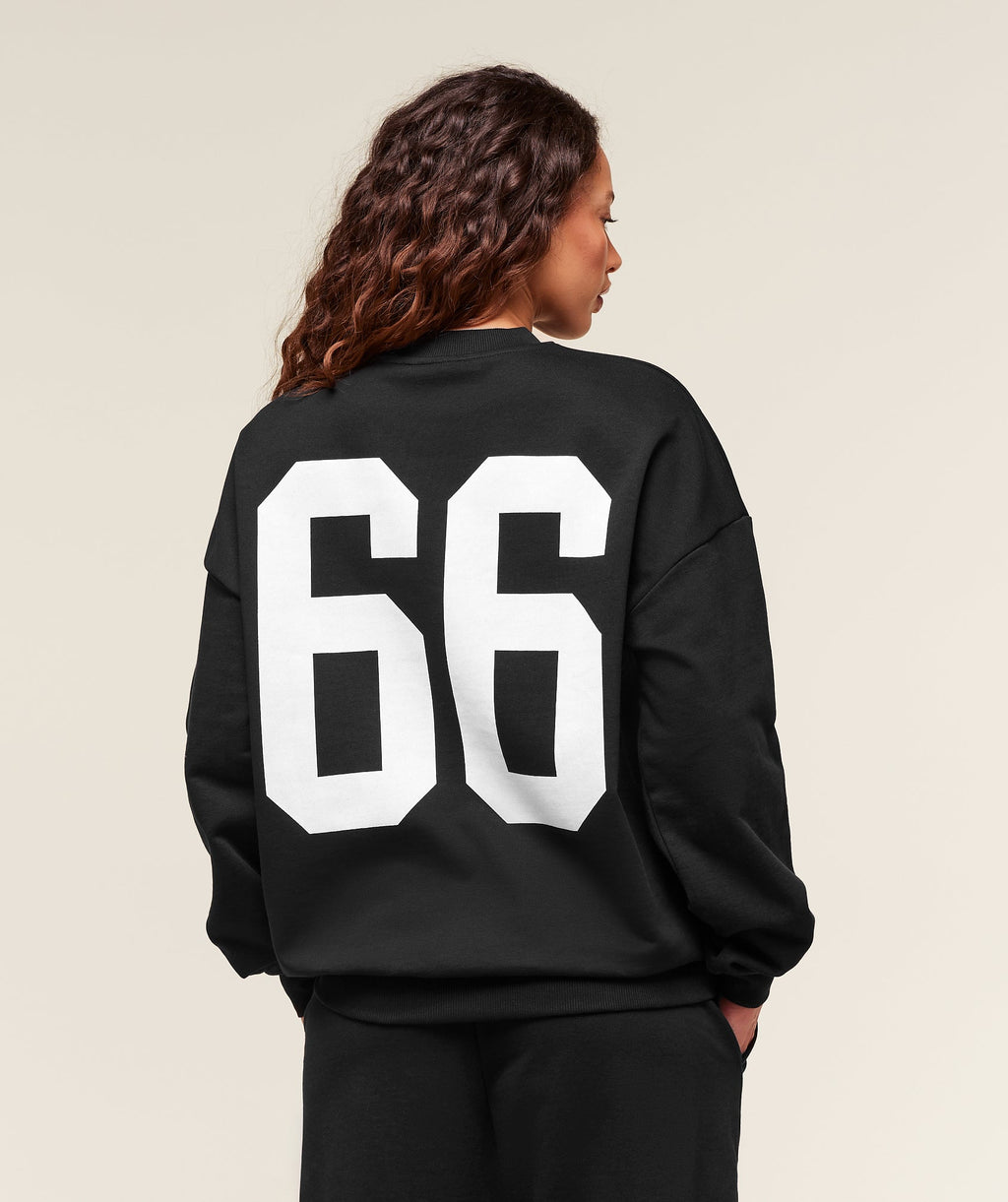 gymshark-varsity-graphic-pullover-pullovers-black-ss25