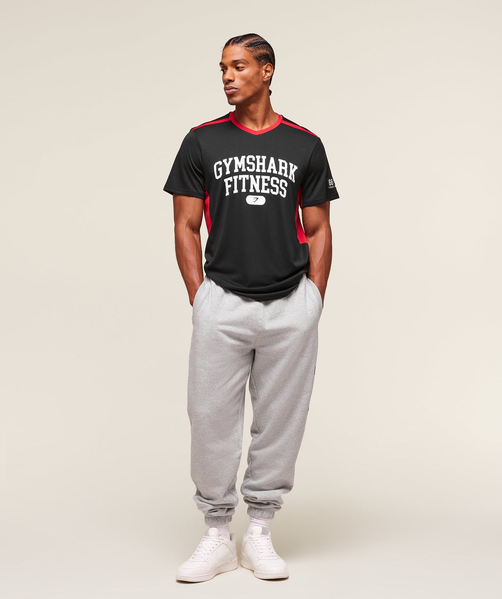 gymshark-varsity-tech-t-shirt-ss-tops-black-ss25