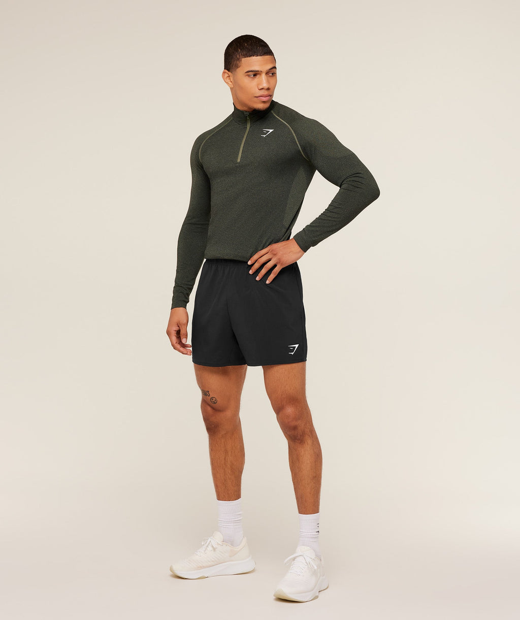 gymshark-vital-seamless-1-4-zip-core-olive-black-ss23