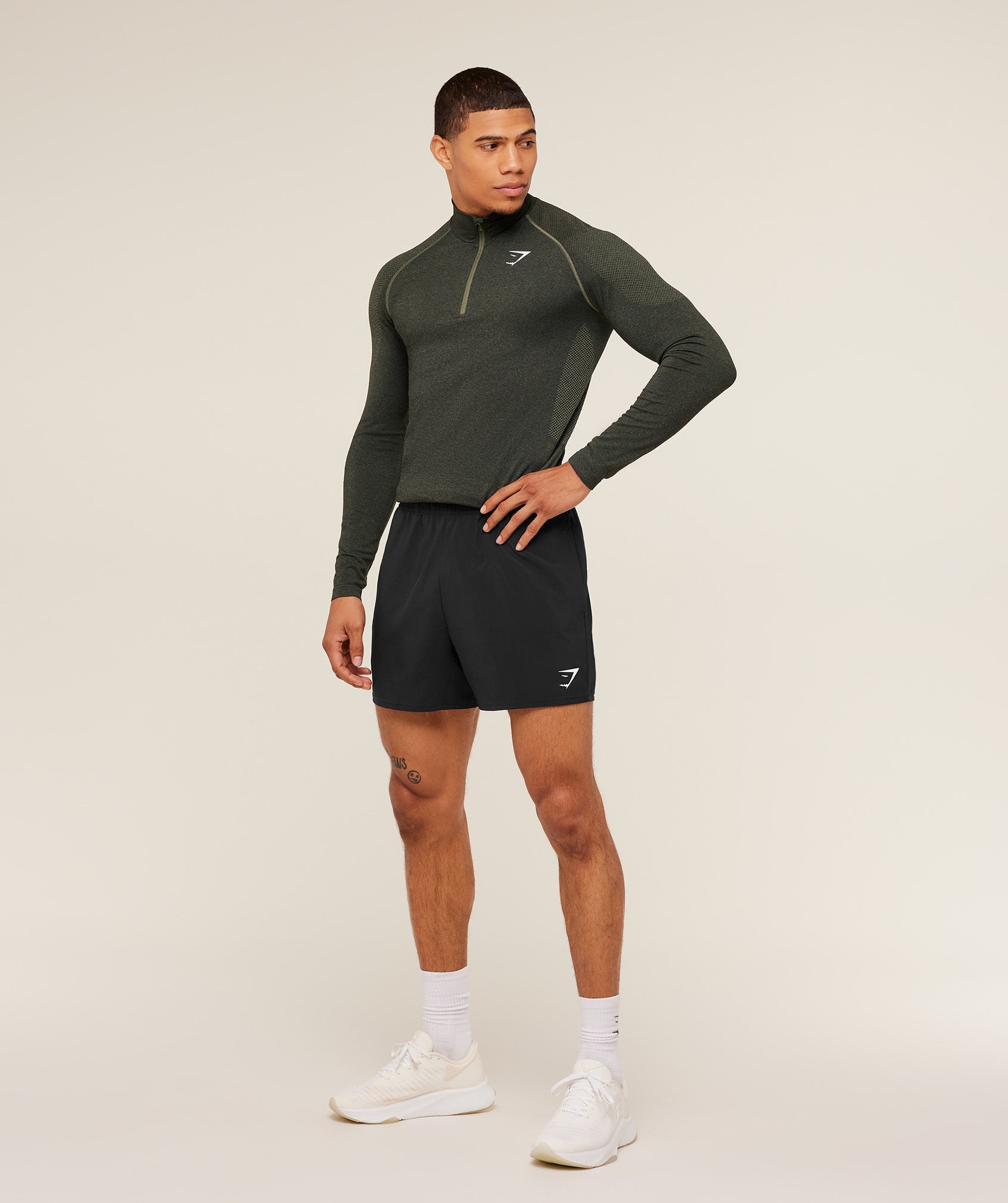 gymshark-vital-seamless-1-4-zip-core-olive-black-ss23