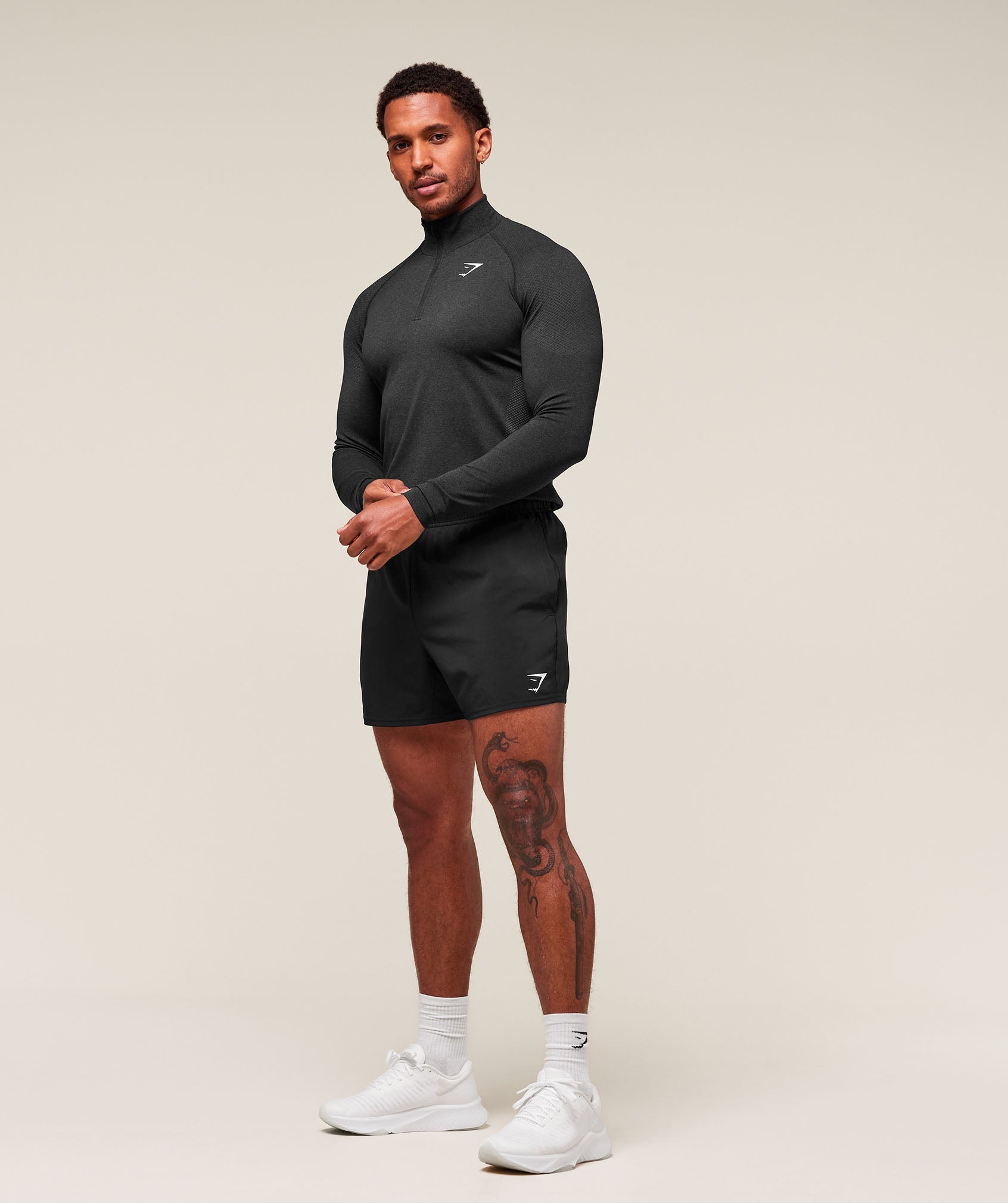 gymshark-vital-seamless-1-4-zip-black-silhouette-grey-aw22