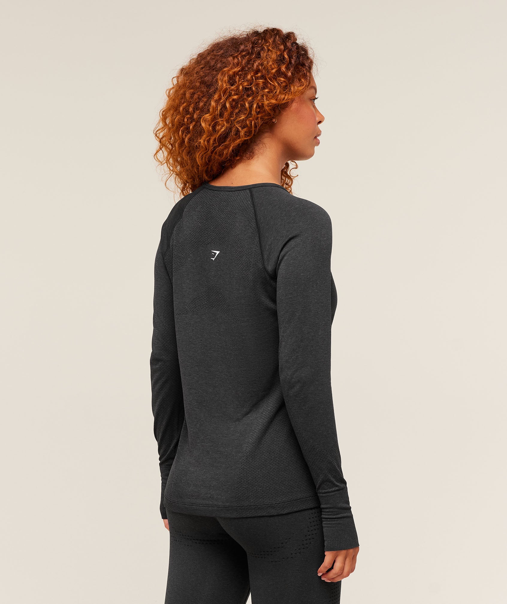 gymshark-vital-seamless-2-0-light-long-sleeve-top-black-marl-ss23