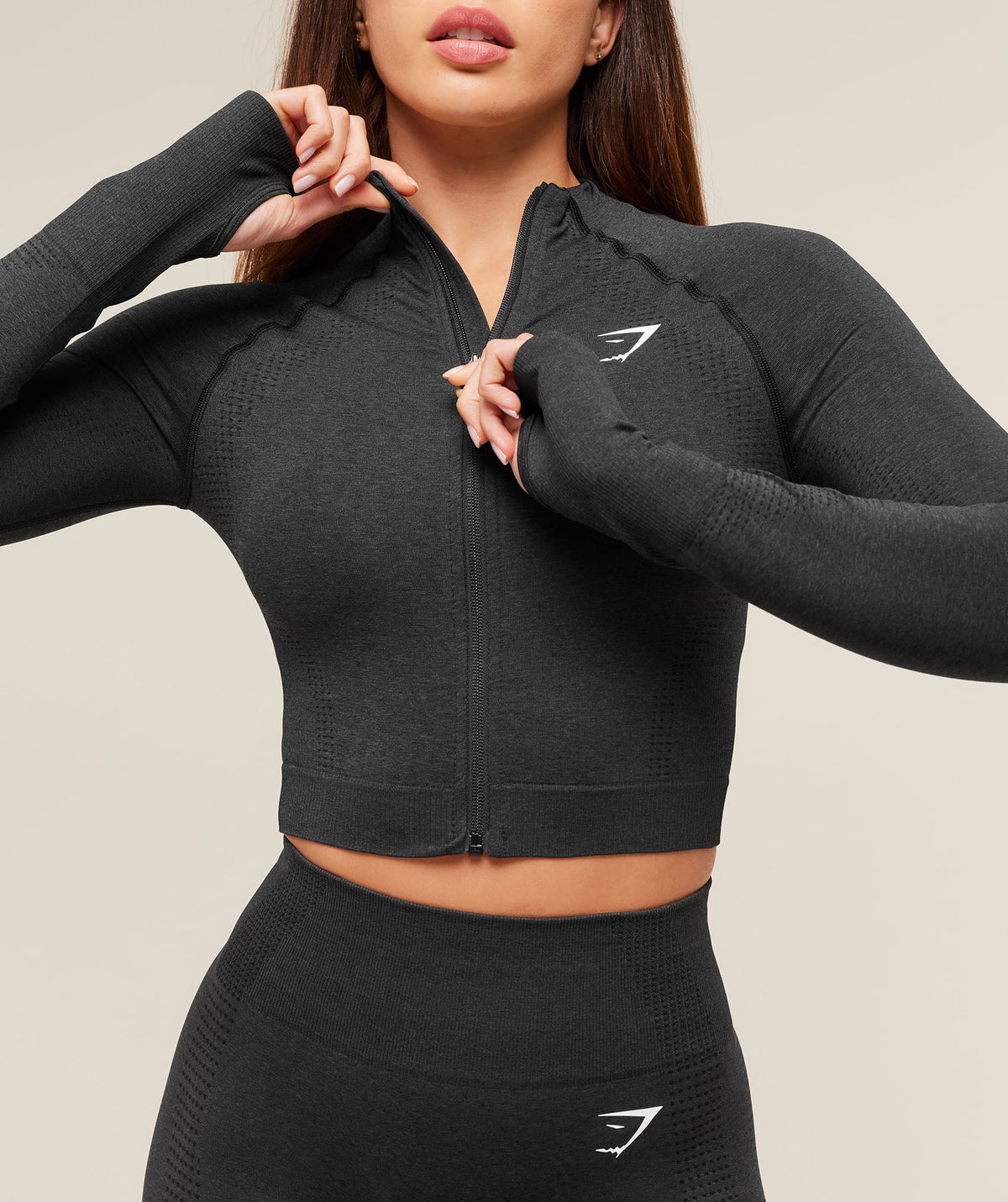 gymshark-vital-seamless-2-0-midi-zip-up-jacket-black-marl-aw23