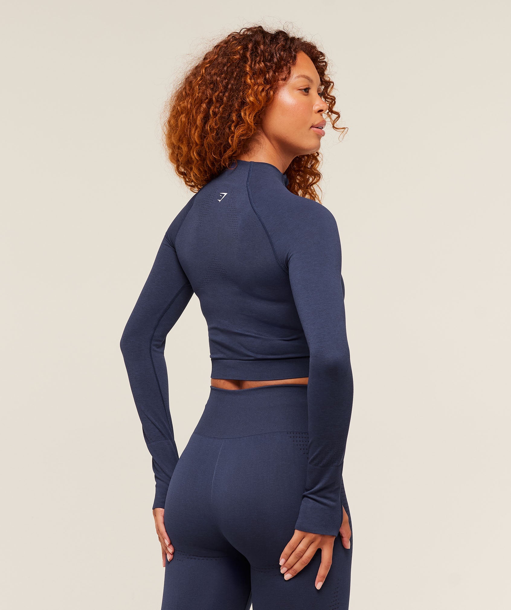 gymshark-vital-seamless-midi-zip-pullover-heavy-blue-marl-aw24