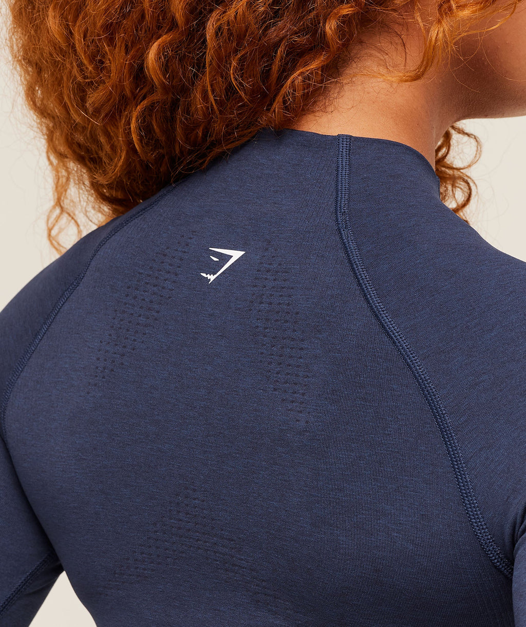 gymshark-vital-seamless-midi-zip-pullover-heavy-blue-marl-aw24