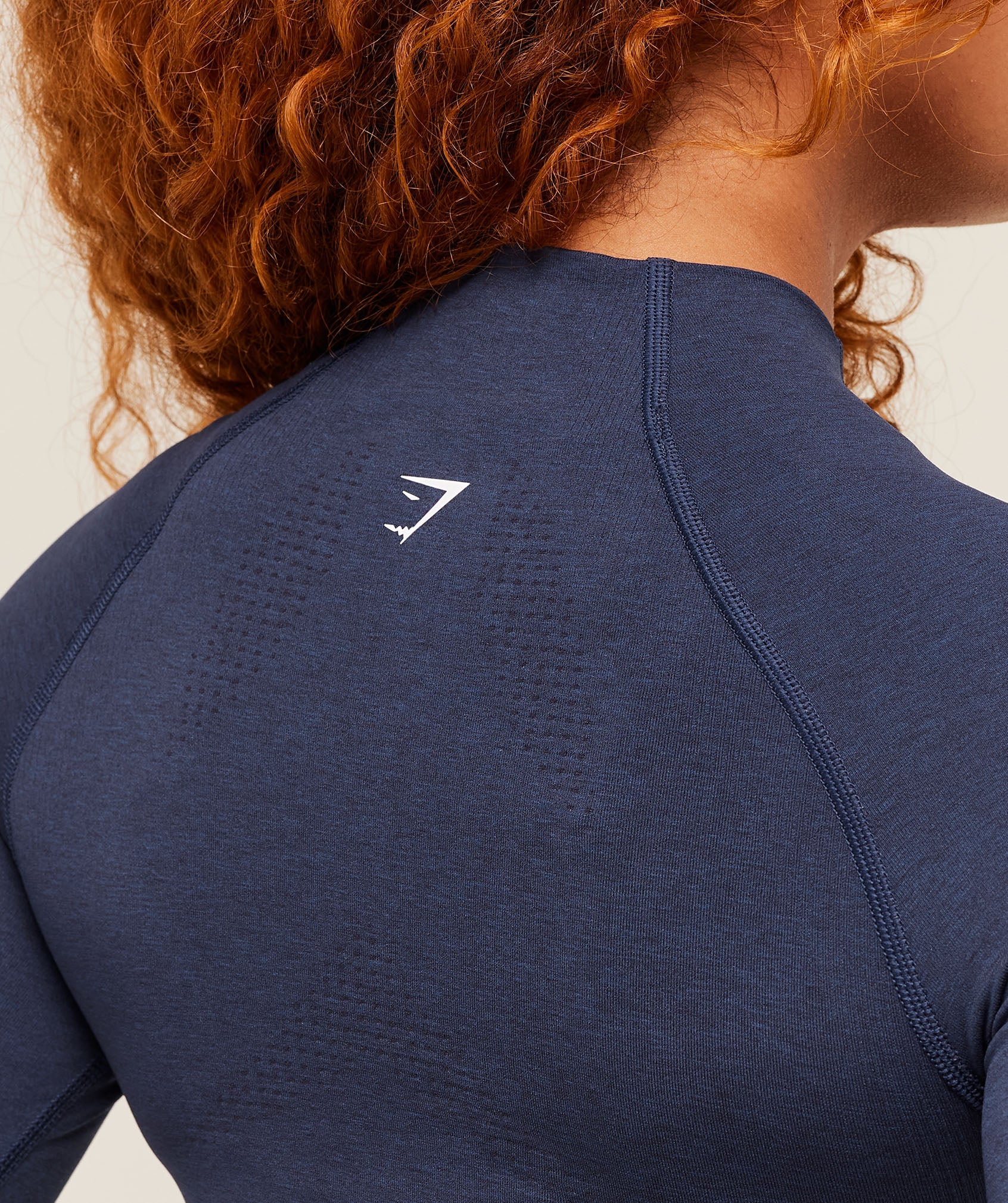 gymshark-vital-seamless-midi-zip-pullover-heavy-blue-marl-aw24