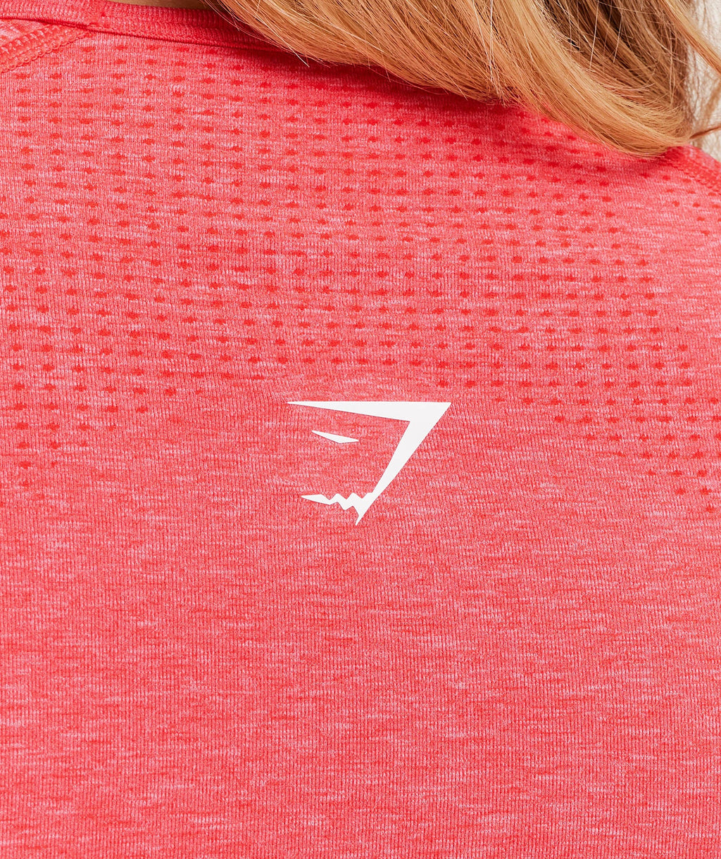 gymshark-vital-seamless-long-sleeve-cut-out-top-coral-red-marl-ss25