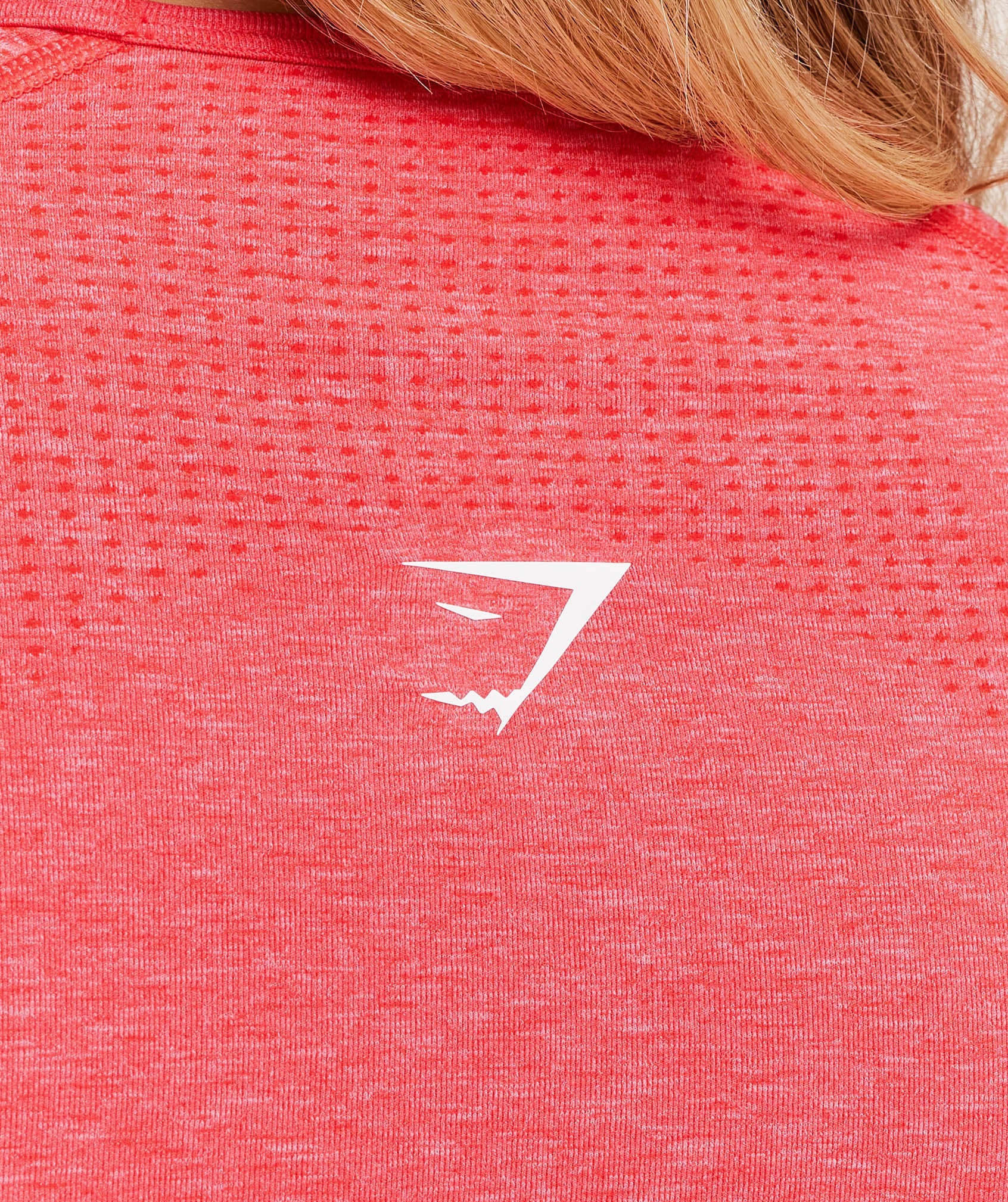 gymshark-vital-seamless-long-sleeve-cut-out-top-coral-red-marl-ss25