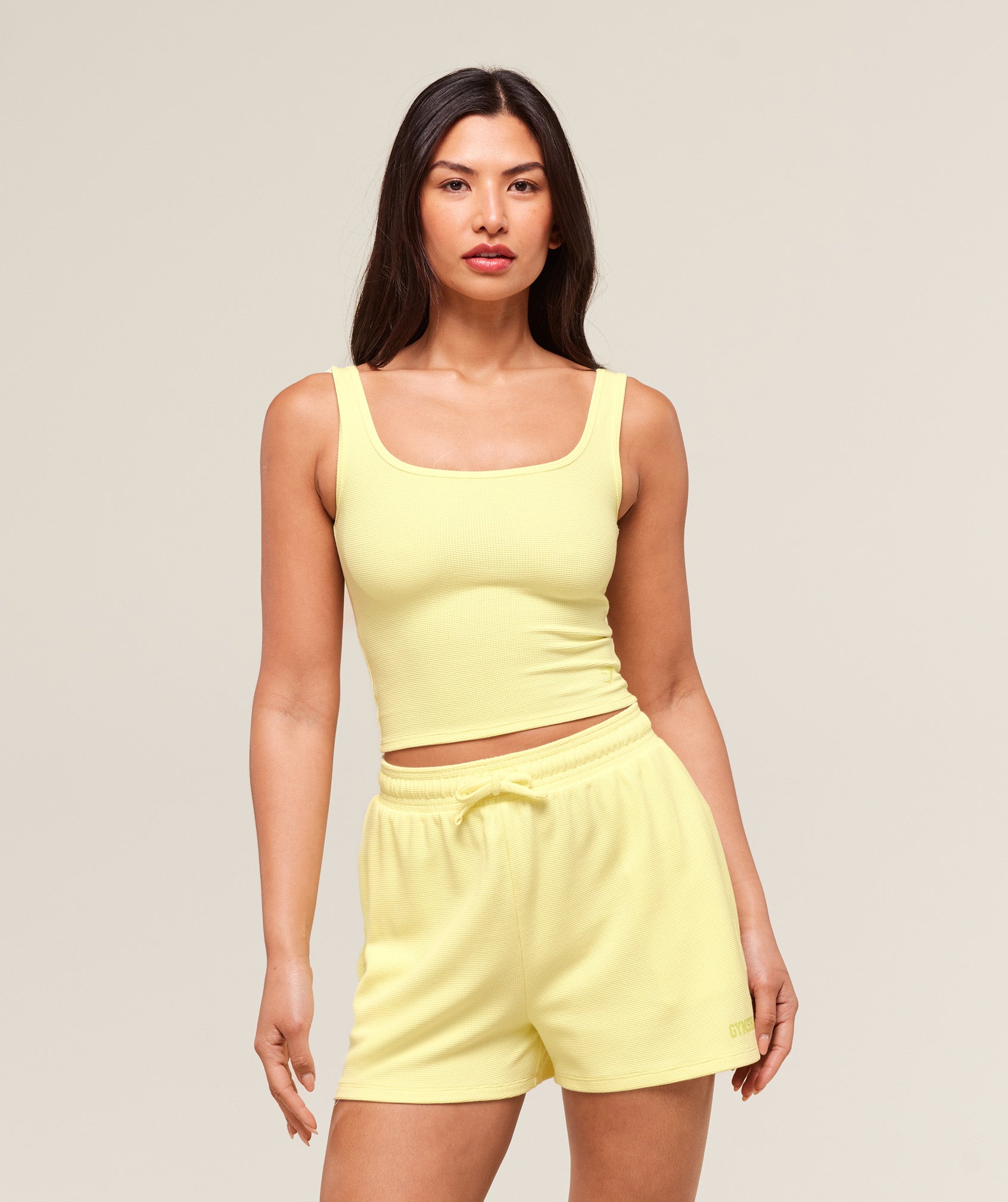 gymshark-waffle-cropped-tank-crop-tops-yellow-ss25