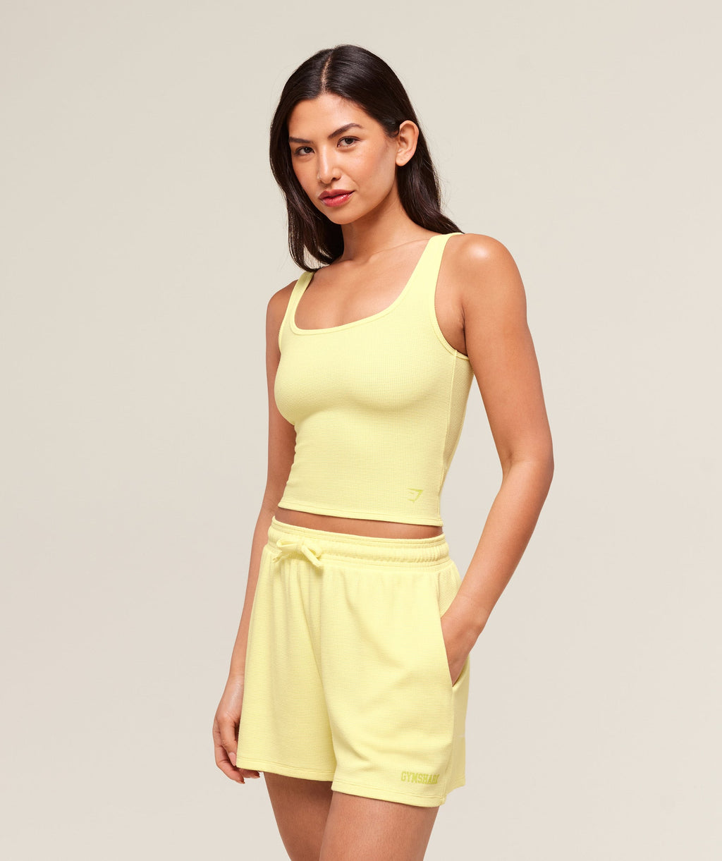 gymshark-waffle-cropped-tank-crop-tops-yellow-ss25