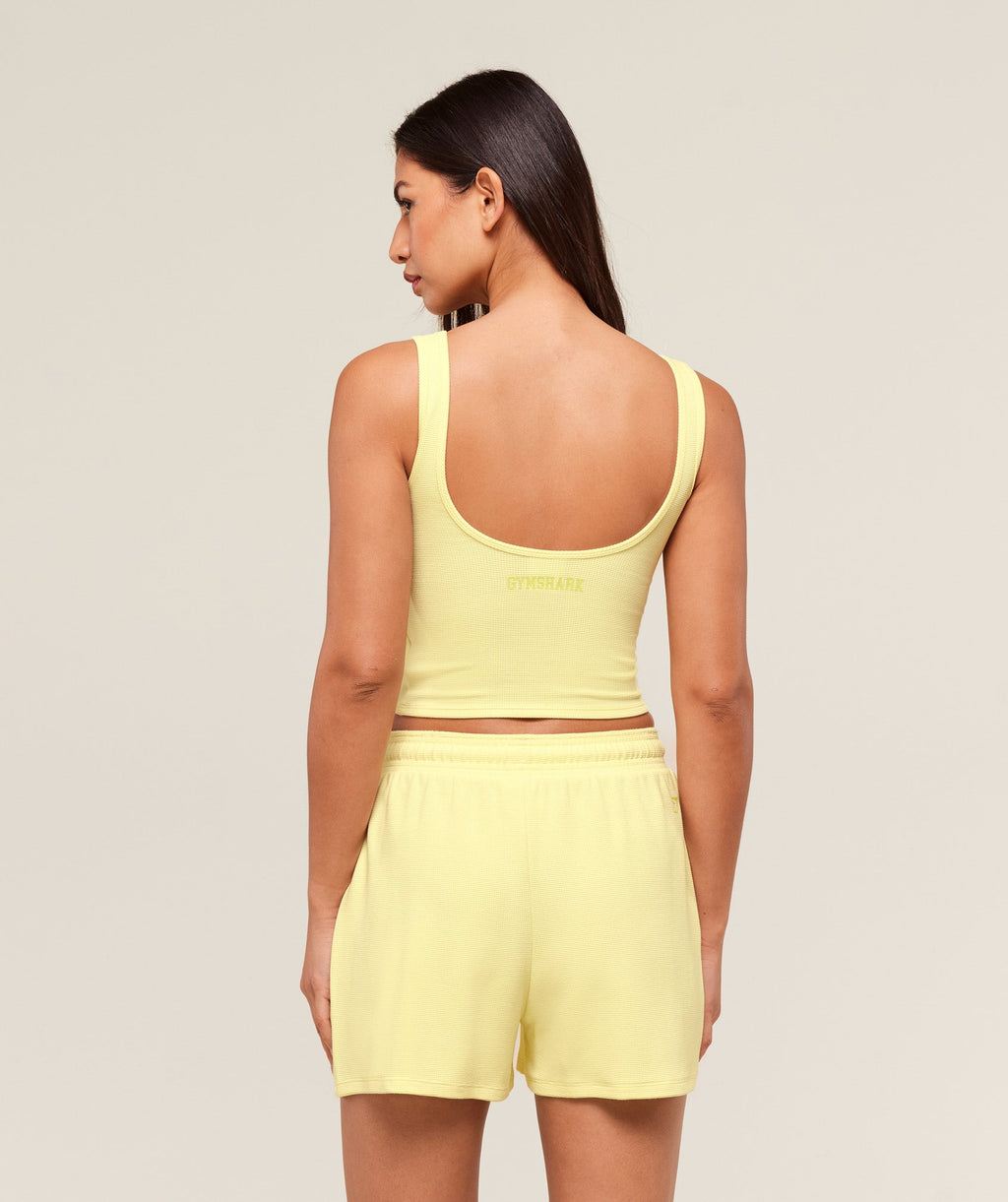gymshark-waffle-cropped-tank-crop-tops-yellow-ss25