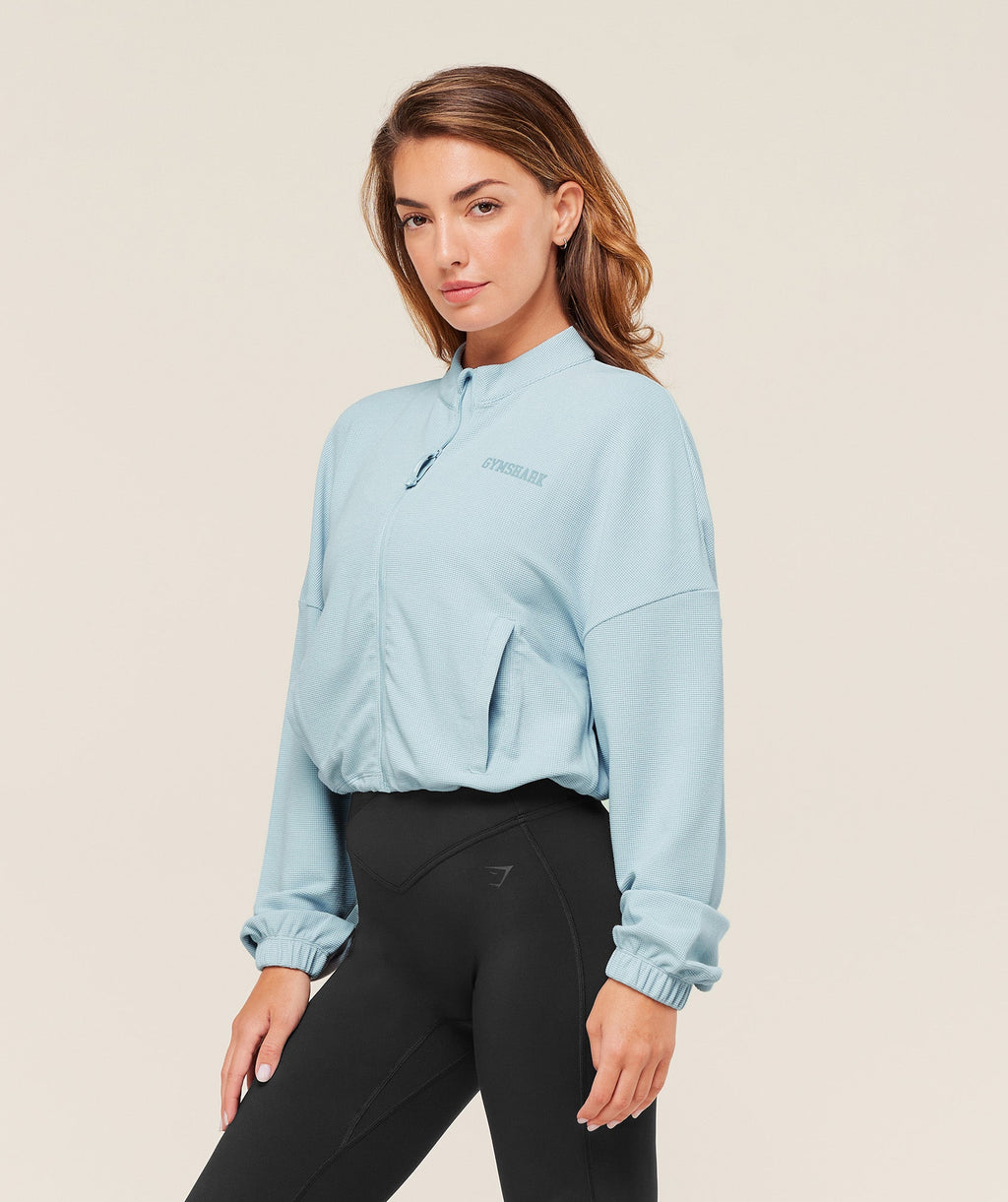 gymshark-waffle-midi-zip-up-jacket-jackets-outerwear-blue-aw25