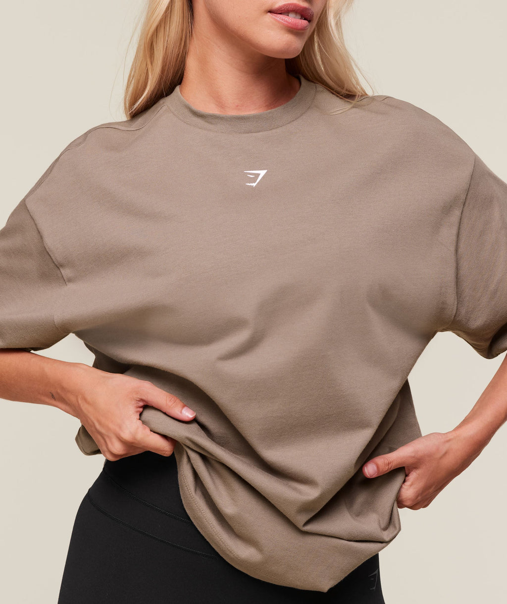 gymshark-we-do-gym-graphic-oversized-t-shirt-ss-tops-brown-ss25