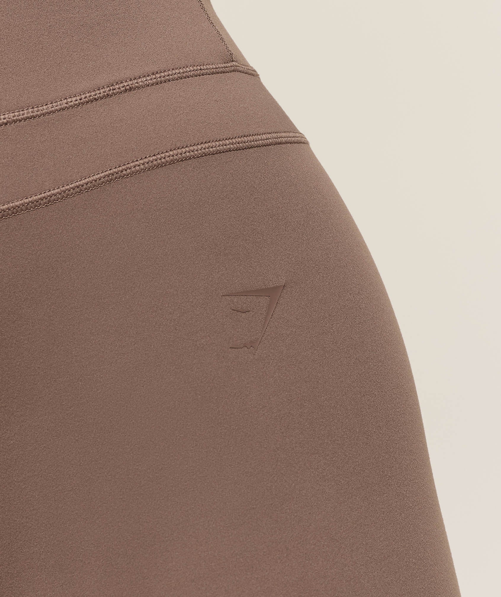 gymshark-gymshark-x-whitney-simmons-flared-leggings-leggings-brown-aw25