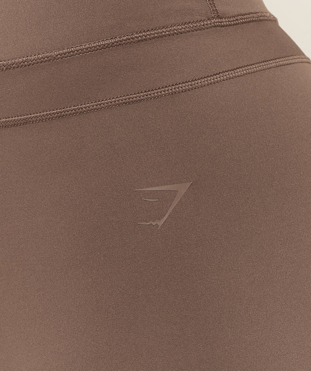 gymshark-gymshark-x-whitney-simmons-tall-flared-leggings-leggings-brown-aw25