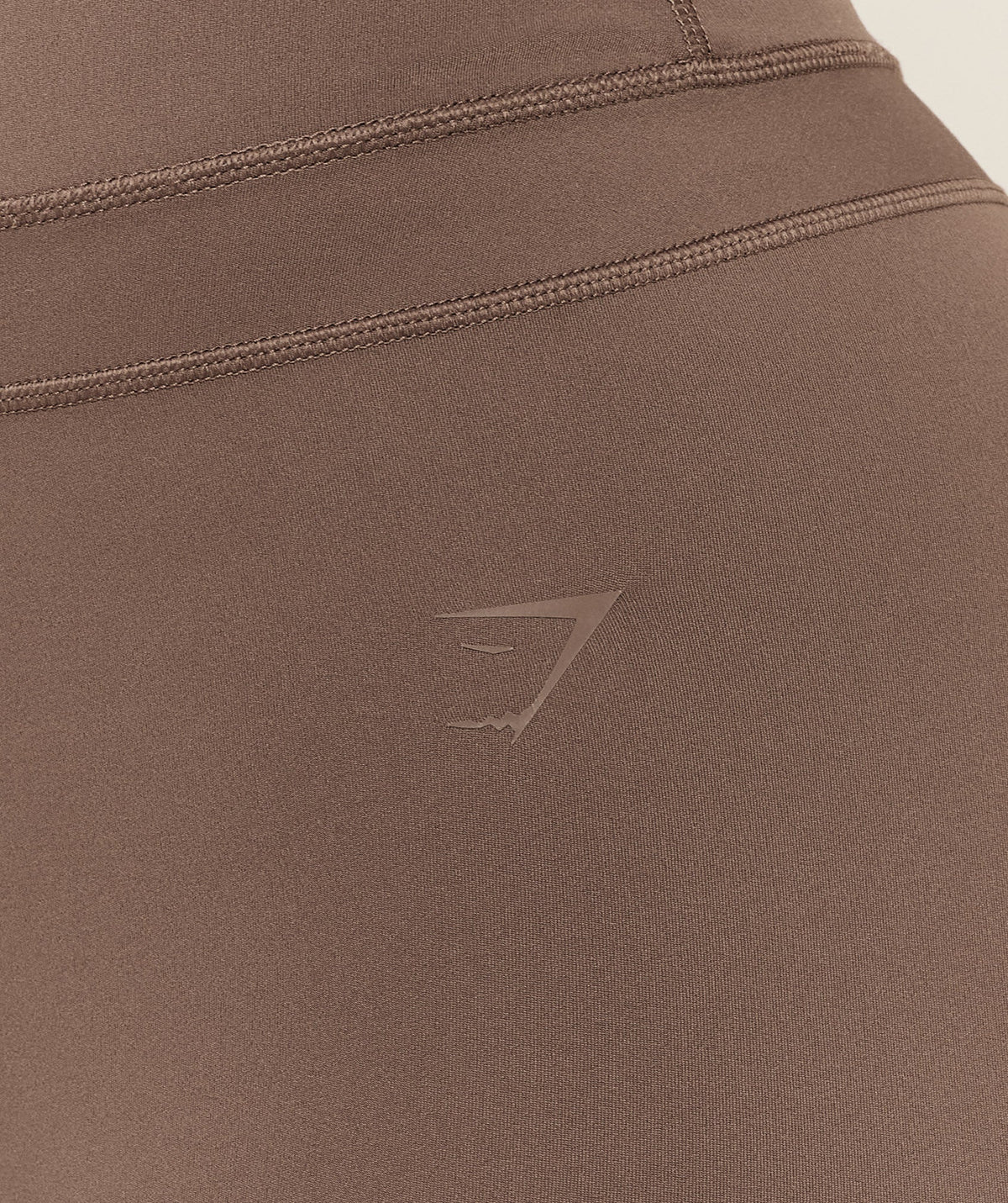 gymshark-gymshark-x-whitney-simmons-tall-flared-leggings-leggings-brown-aw25