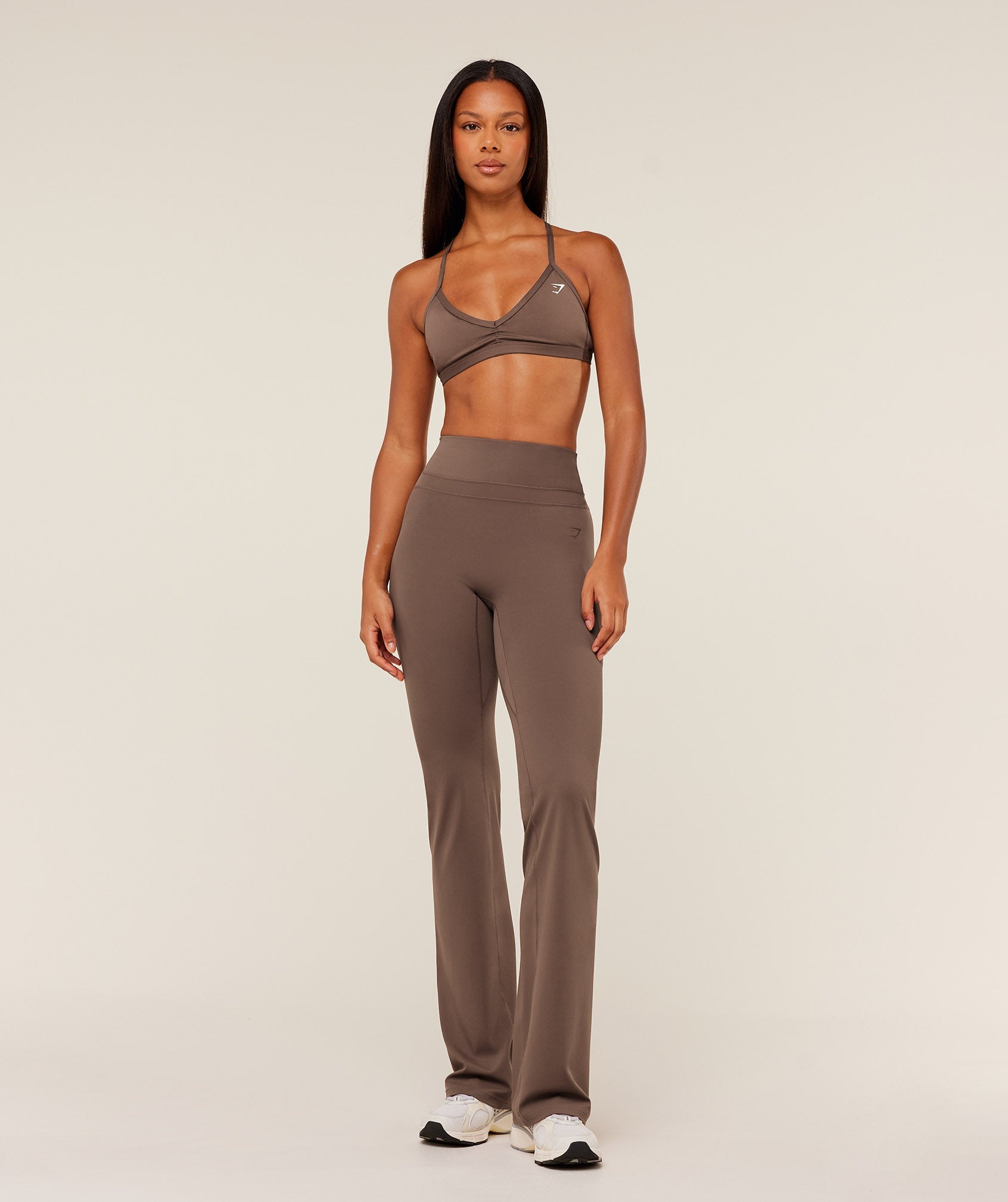 gymshark-gymshark-x-whitney-simmons-tall-flared-leggings-leggings-brown-aw25