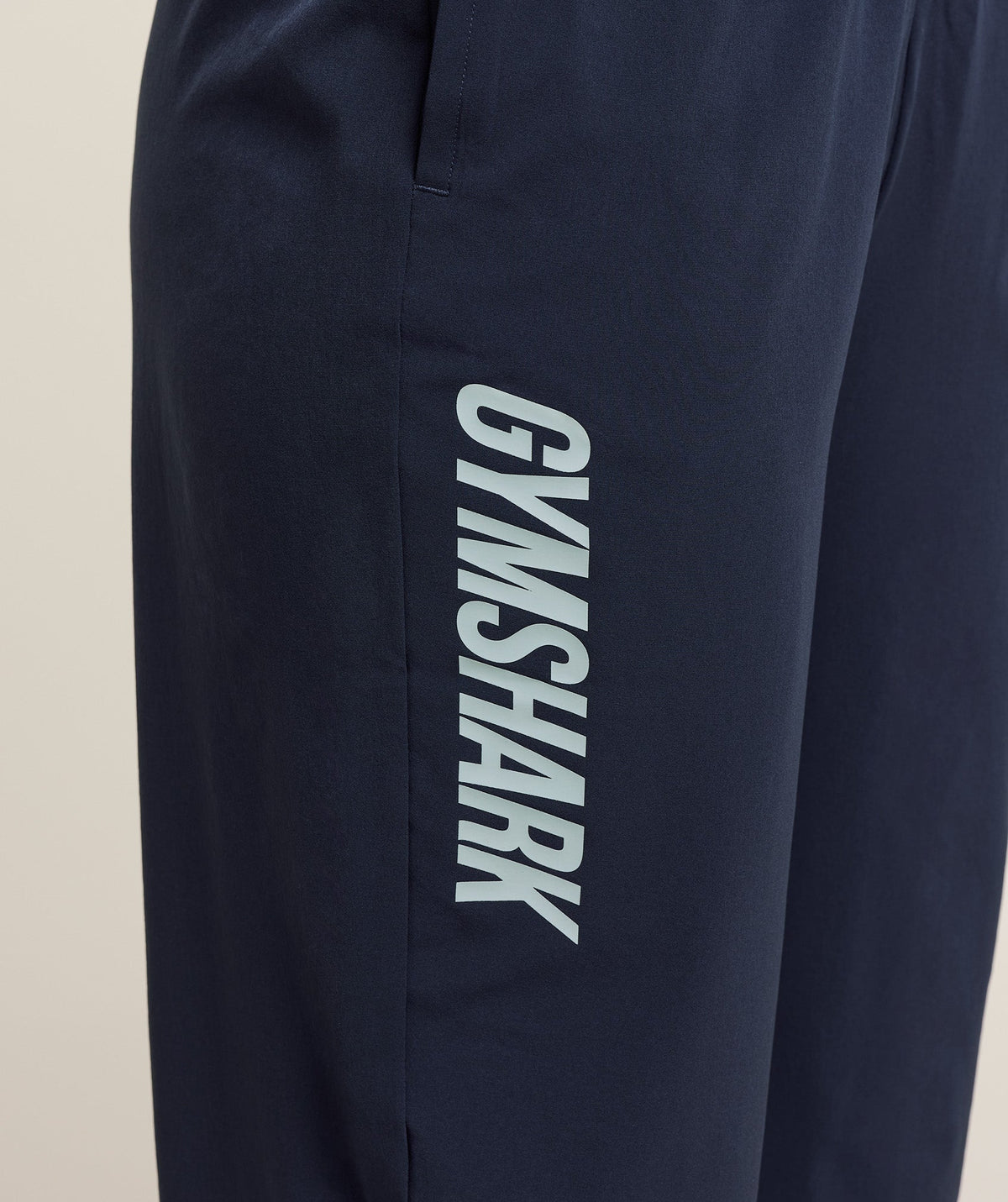 gymshark-woven-track-straight-leg-pant-pants