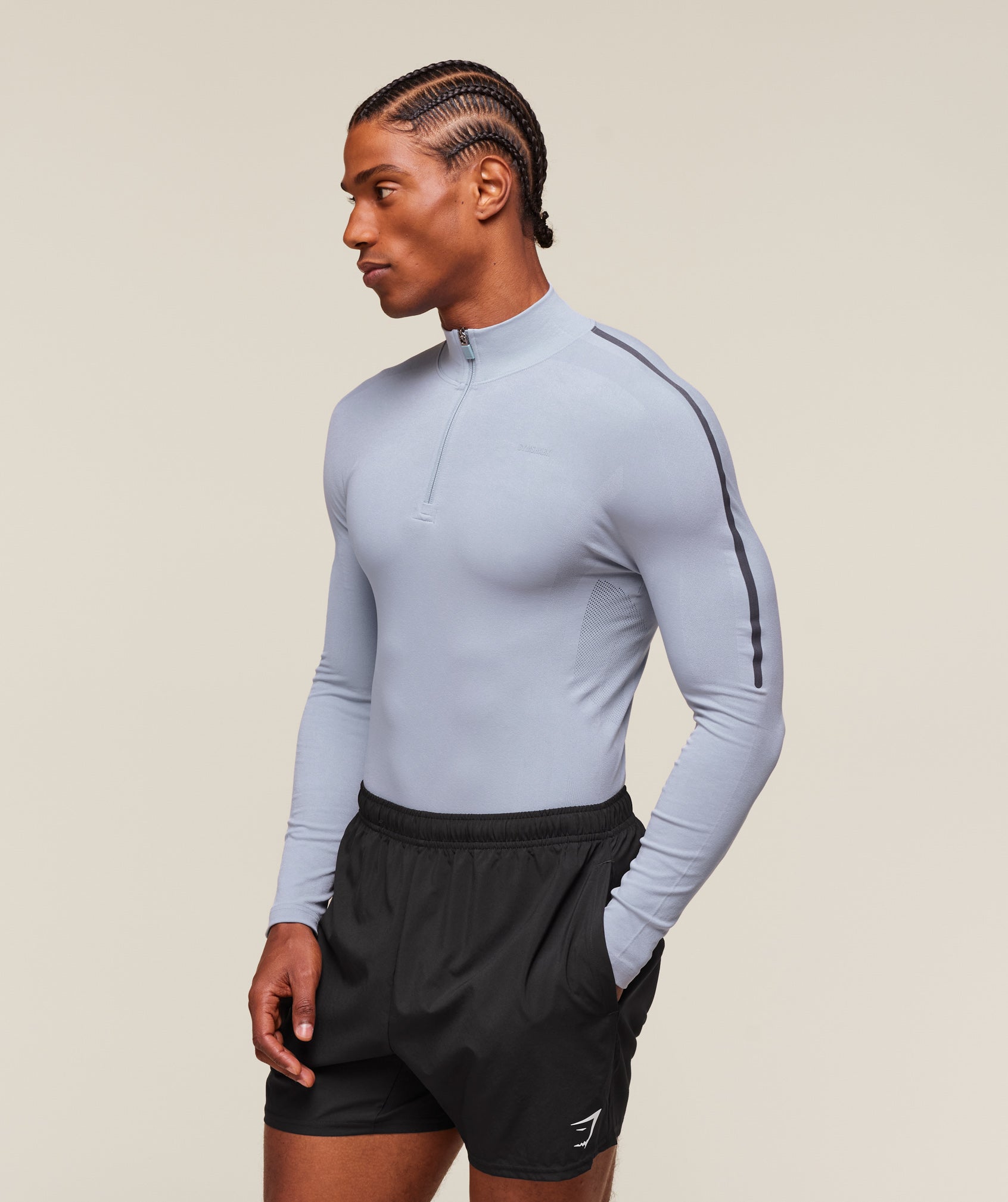 gymshark-everywear-warp-knit-polo-1-4-zip-ls-tops-blue-ss24