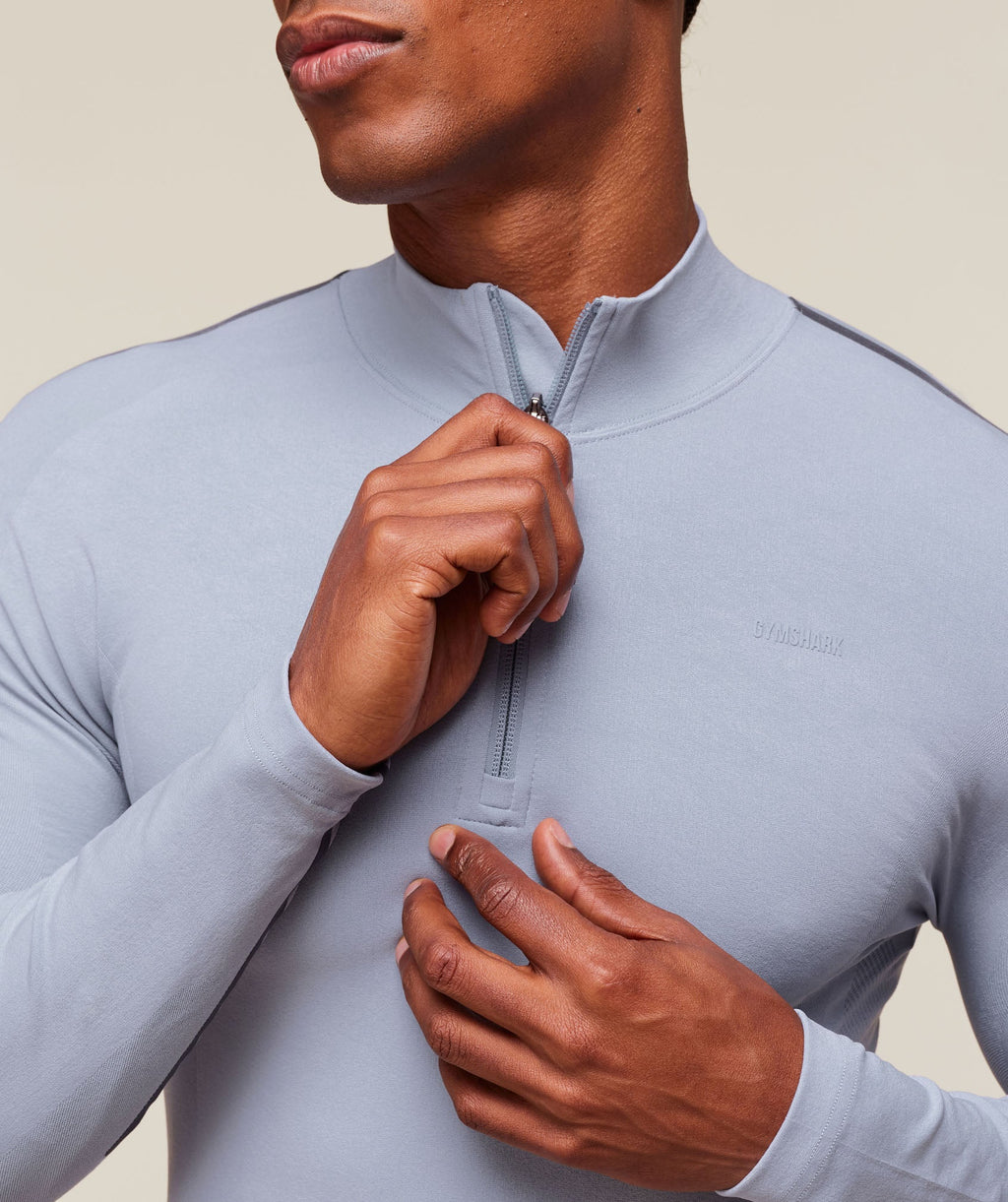 gymshark-everywear-warp-knit-polo-1-4-zip-ls-tops-blue-ss24