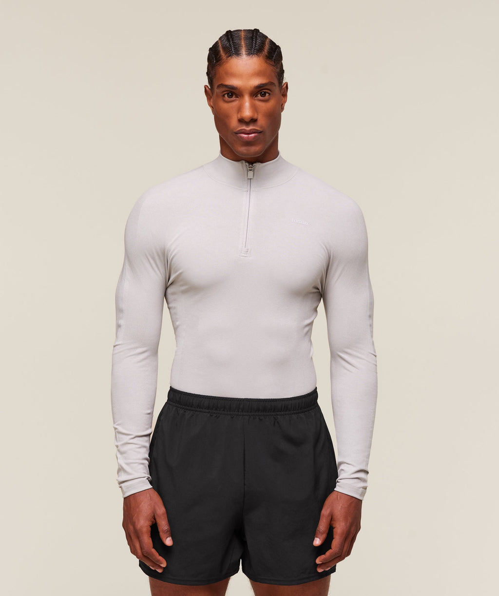 gymshark-everywear-warp-knit-polo-1-4-zip-ls-tops-grey-ss24