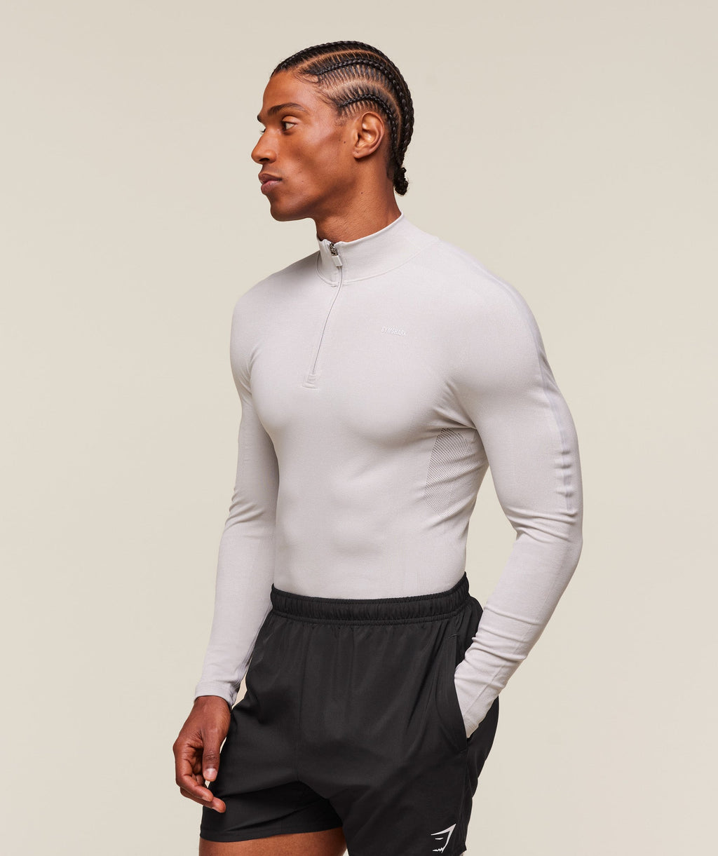 gymshark-everywear-warp-knit-polo-1-4-zip-ls-tops-grey-ss24